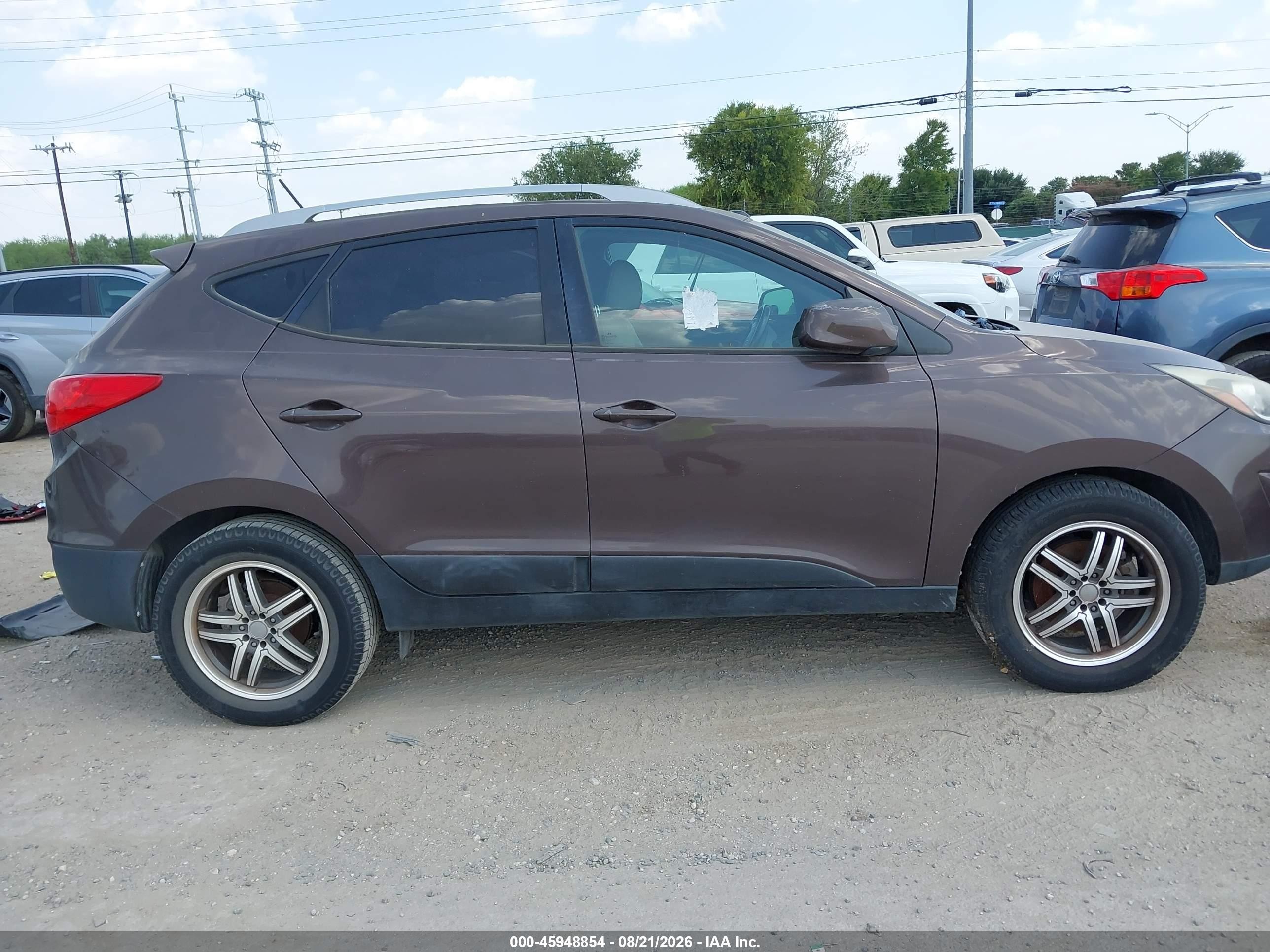 2014 Hyundai Tucson Se Коричневый vin: KM8JU3AGXEU827716