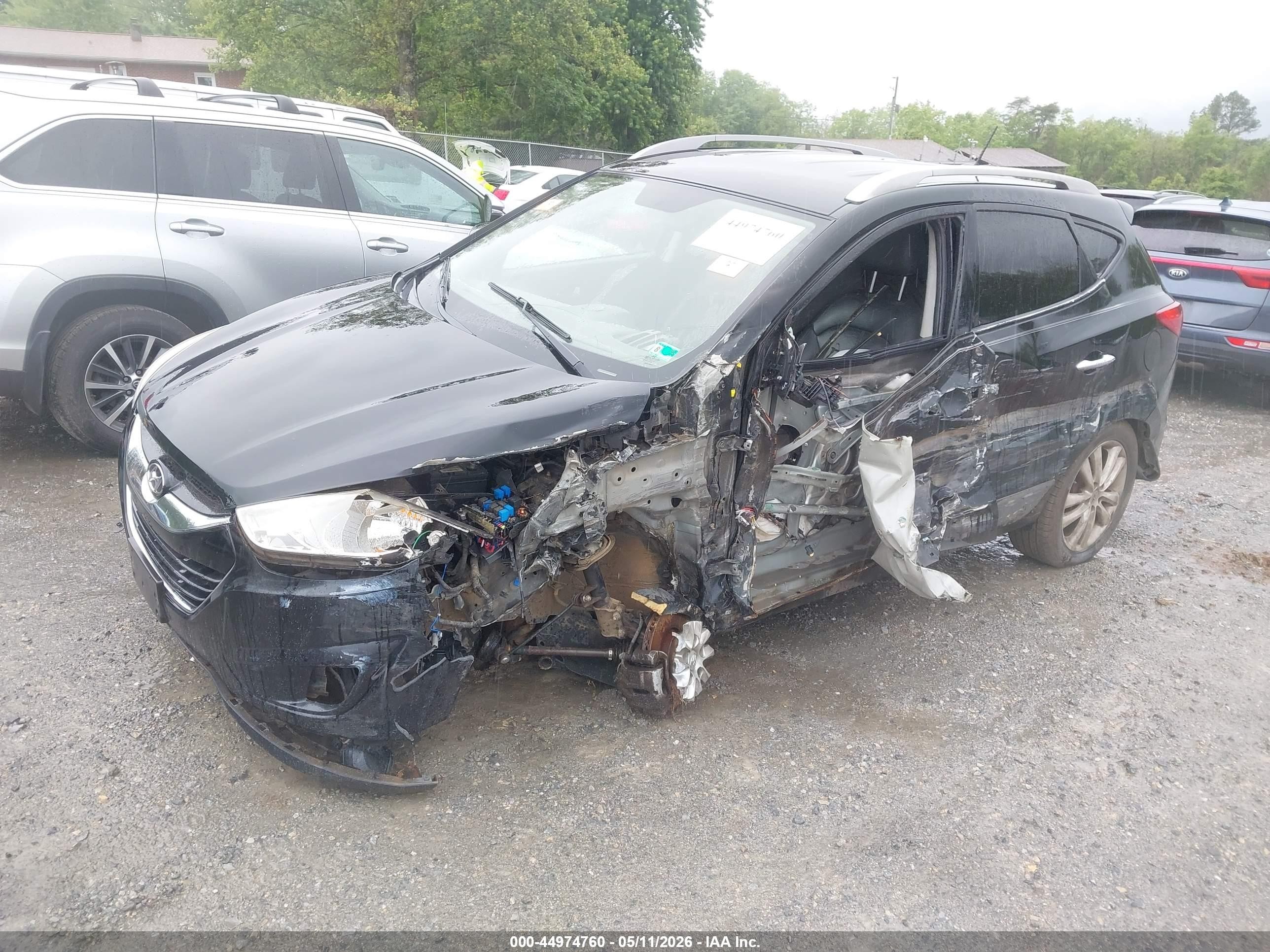 2011 Hyundai Tucson Limited Black vin: KM8JUCAC0BU309560