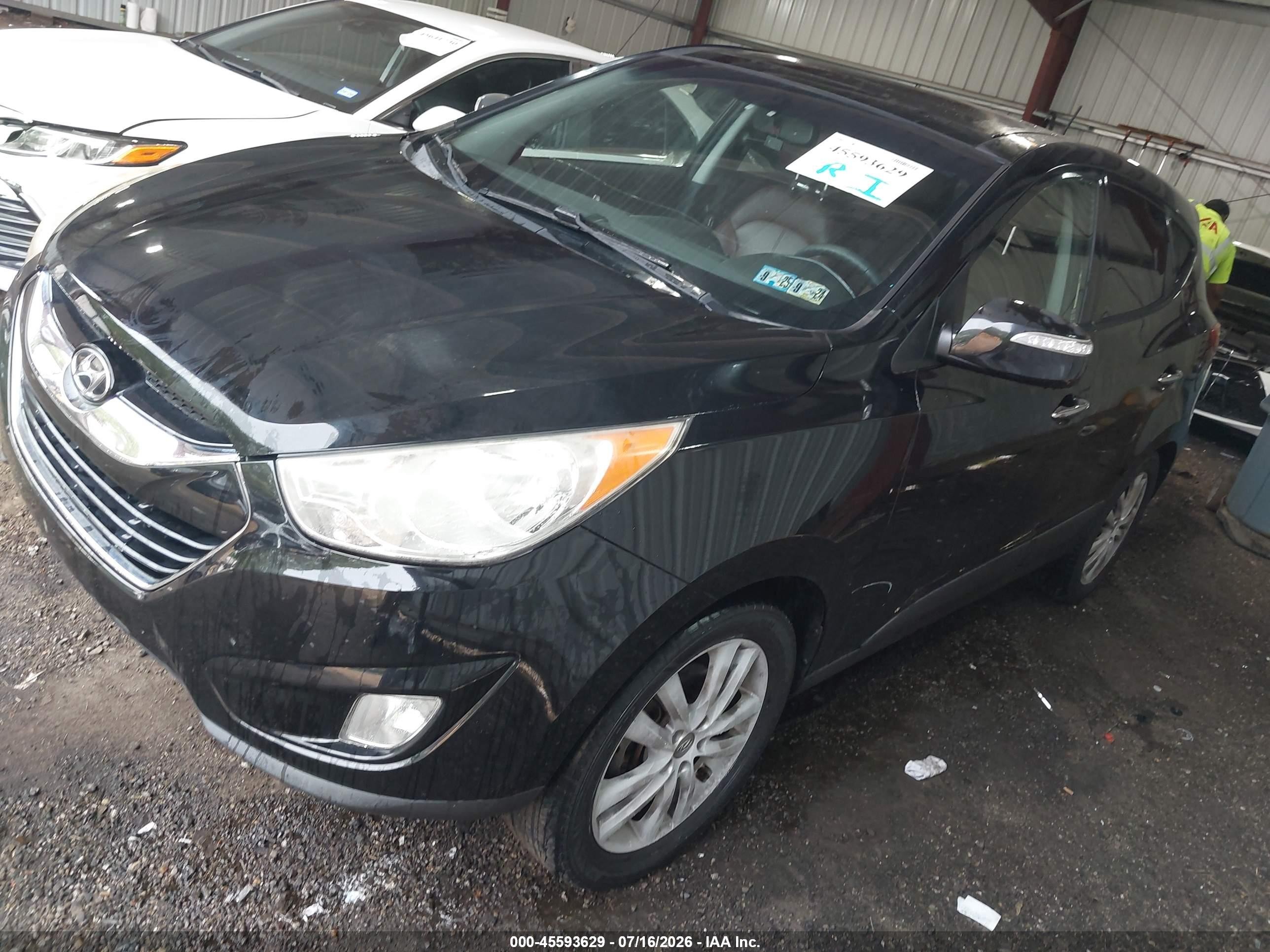 2012 Hyundai Tucson Limited Black vin: KM8JUCAC0CU372790