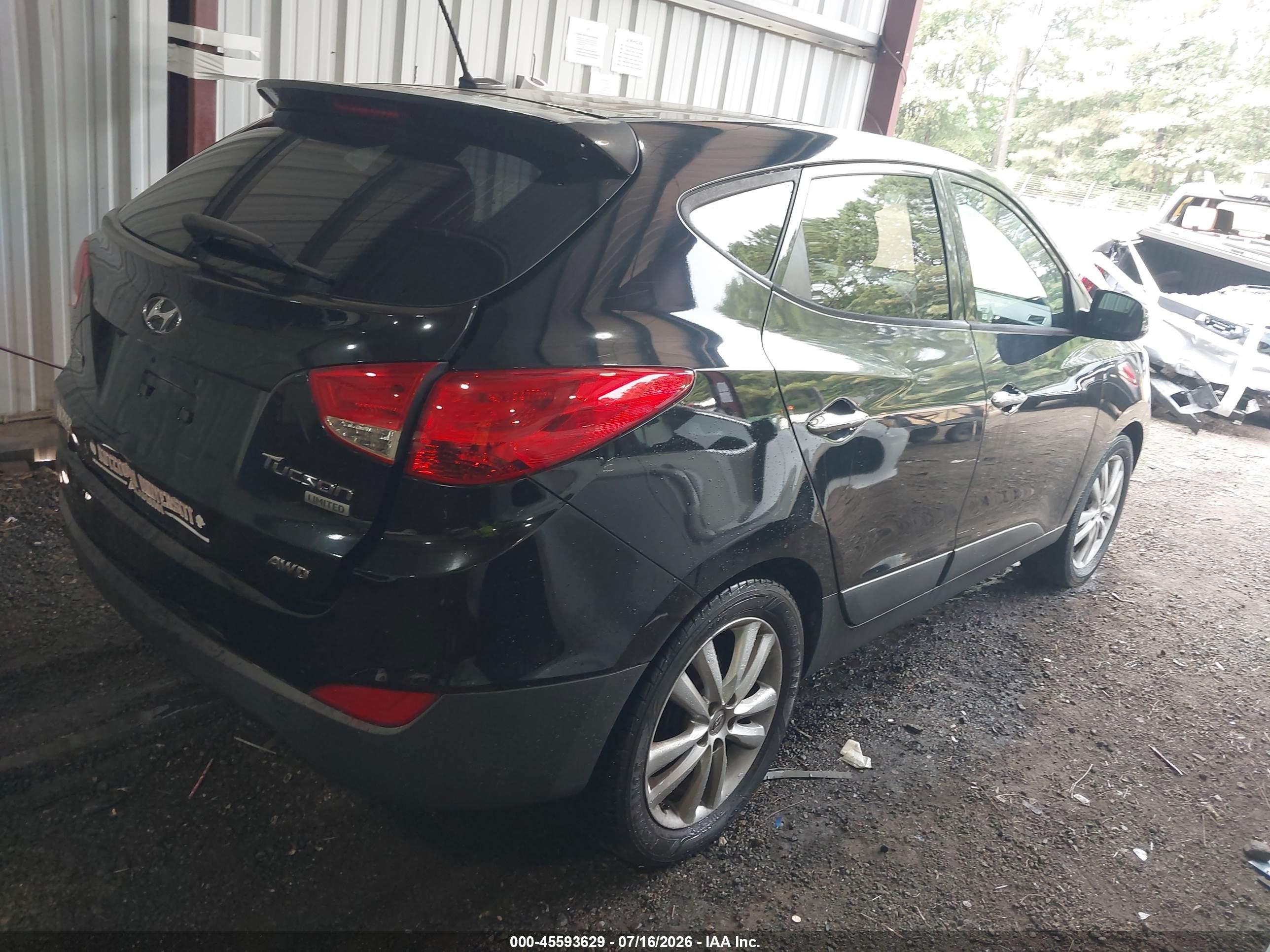 2012 Hyundai Tucson Limited Black vin: KM8JUCAC0CU372790