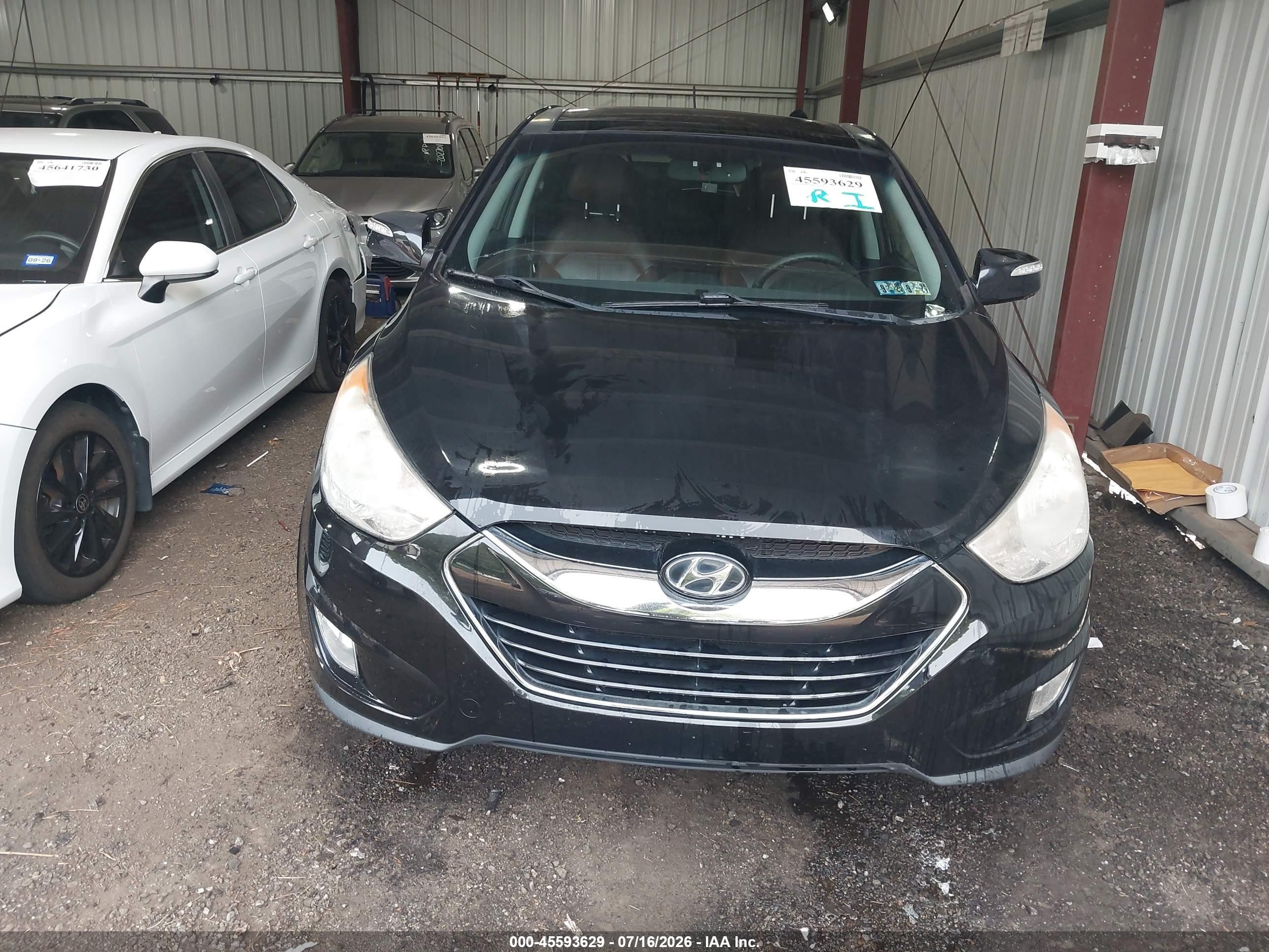 2012 Hyundai Tucson Limited Black vin: KM8JUCAC0CU372790