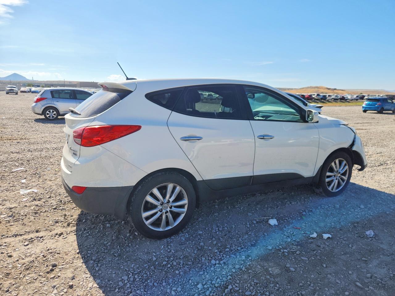 2013 Hyundai Tucson Limited White vin: KM8JUCAC0DU577057