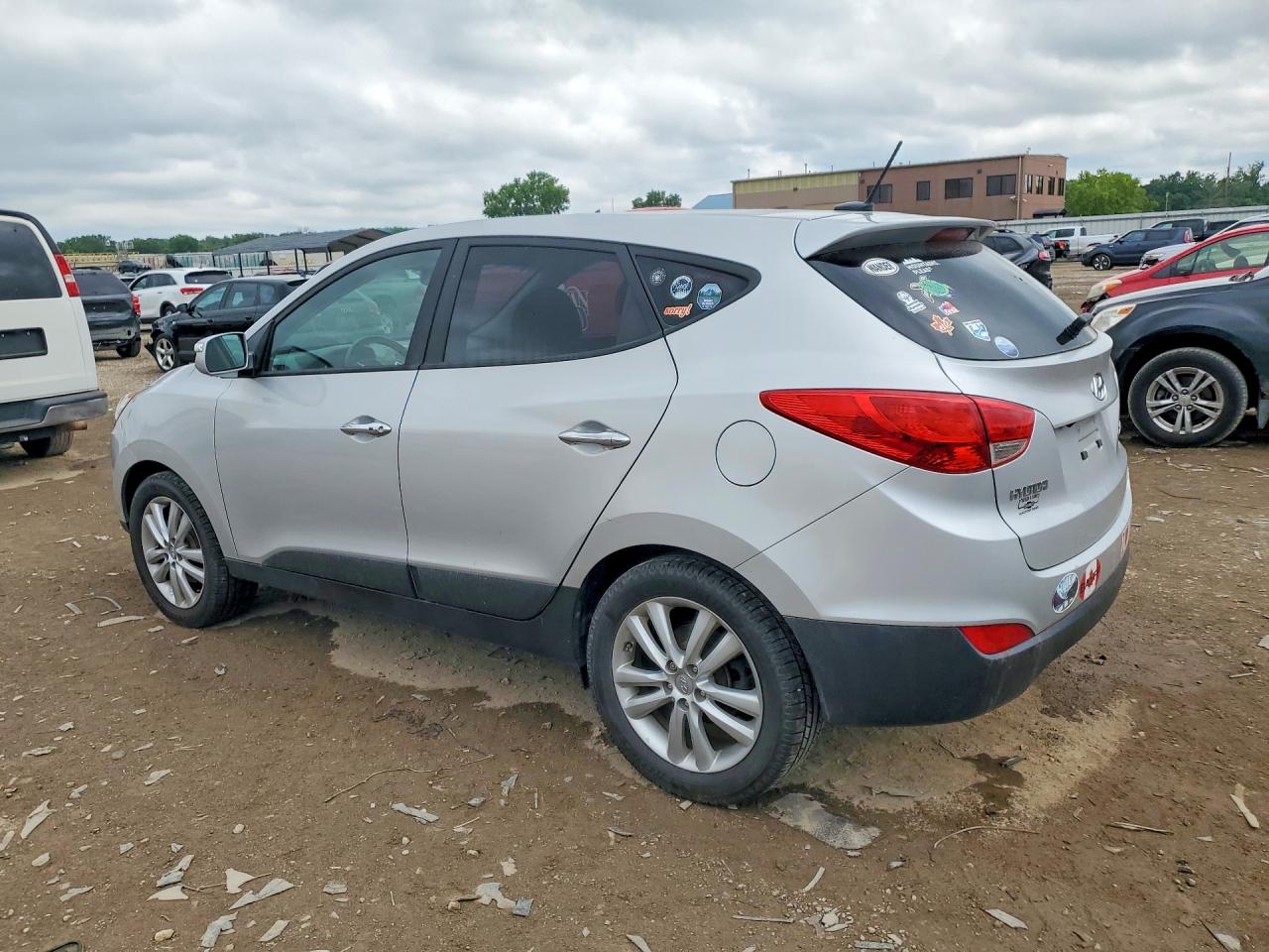 2013 Hyundai Tucson Limited Silver vin: KM8JUCAC0DU578645