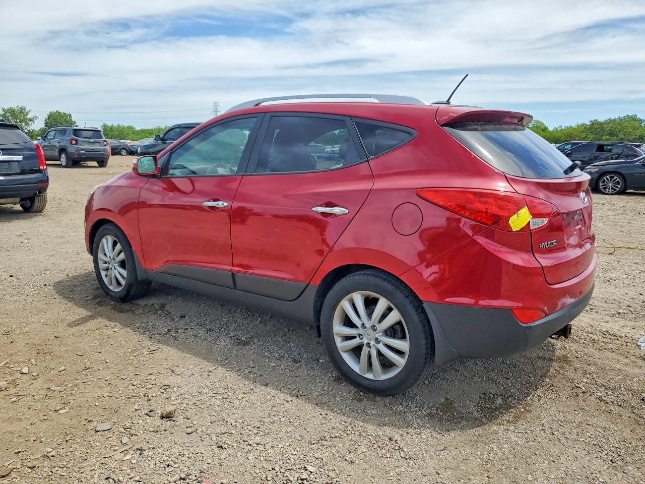 2013 Hyundai Tucson Limited Burgundy vin: KM8JUCAC0DU660102