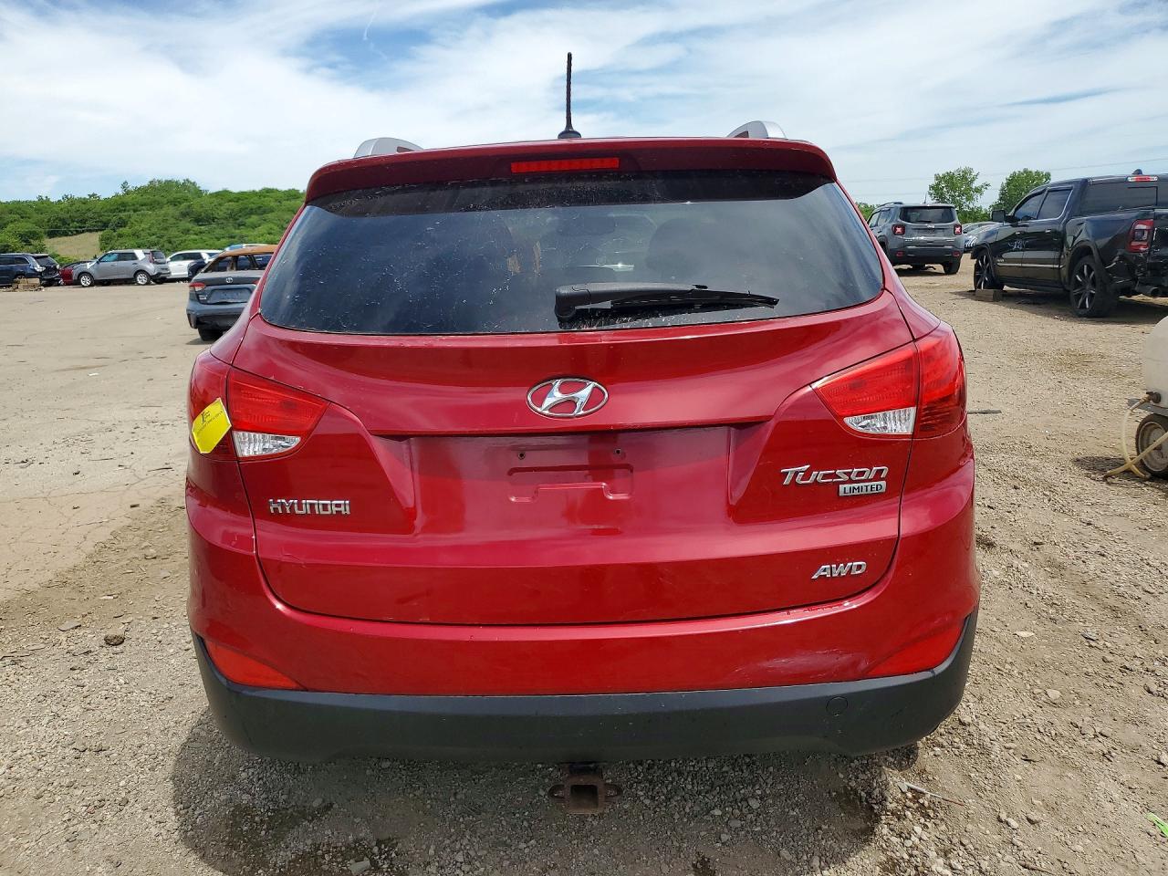 2013 Hyundai Tucson Limited Burgundy vin: KM8JUCAC0DU660102