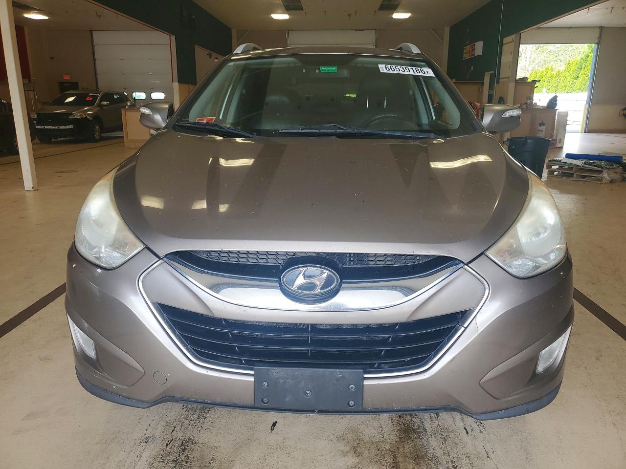 2010 Hyundai Tucson Limited Коричневый vin: KM8JUCAC1AU047207
