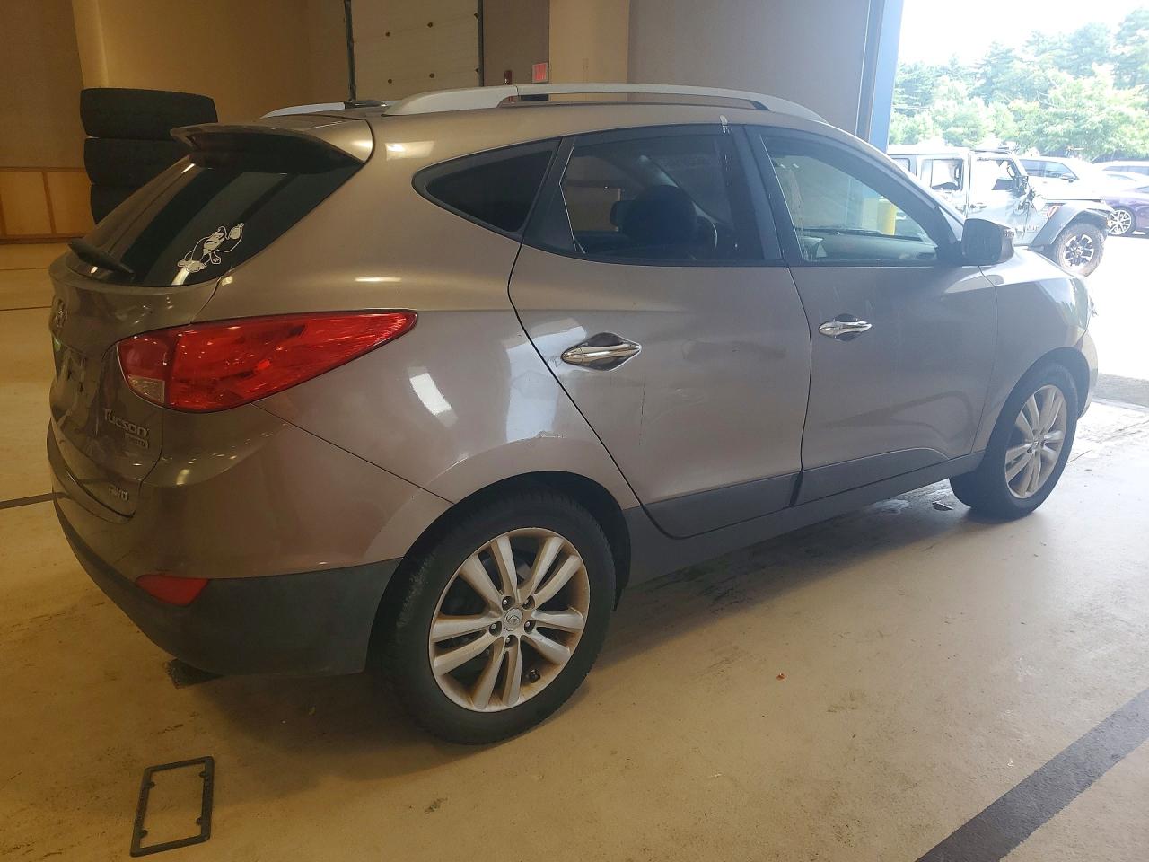 2010 Hyundai Tucson Limited Коричневый vin: KM8JUCAC1AU047207