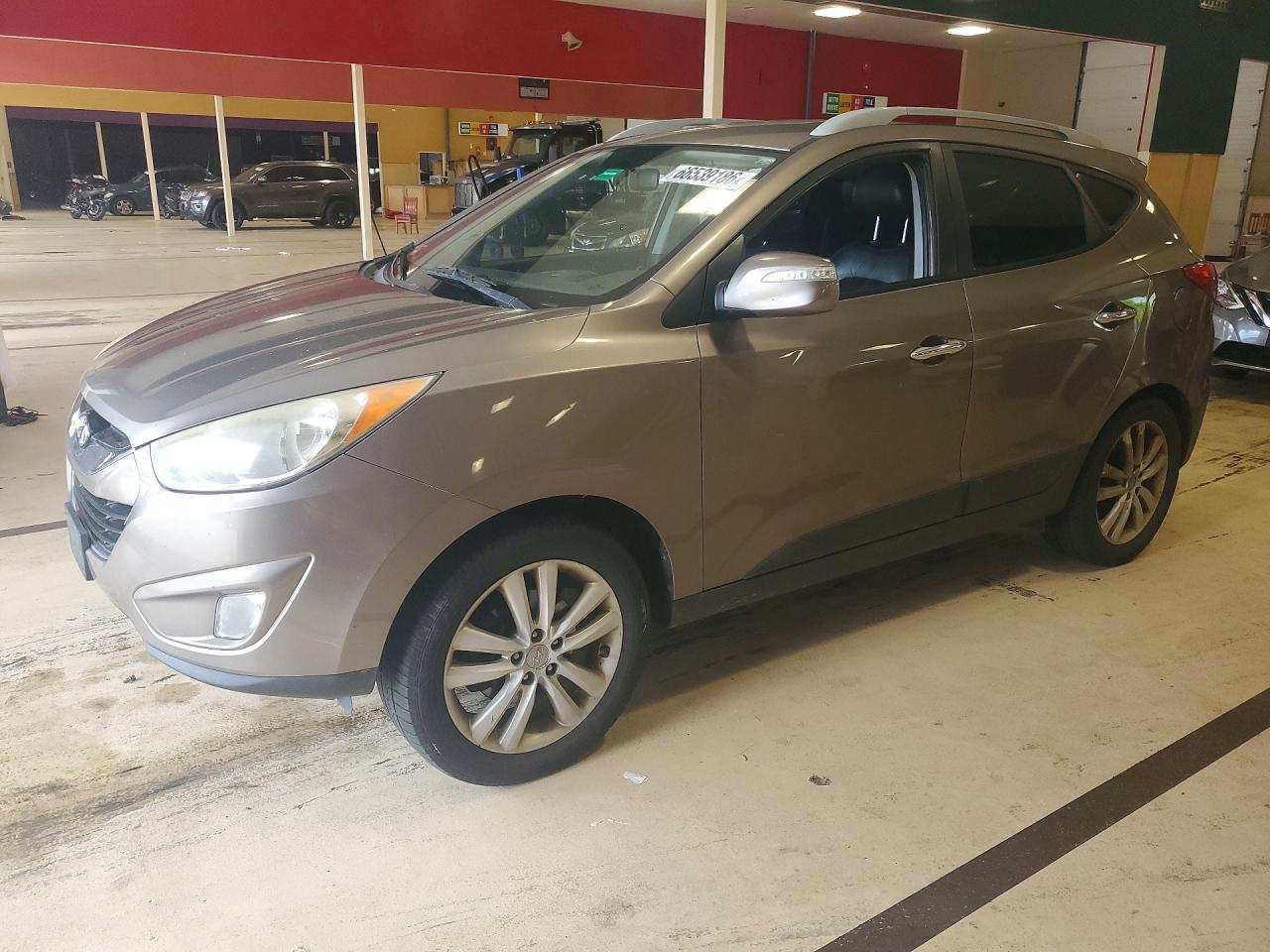 2010 Hyundai Tucson Limited Коричневый vin: KM8JUCAC1AU047207