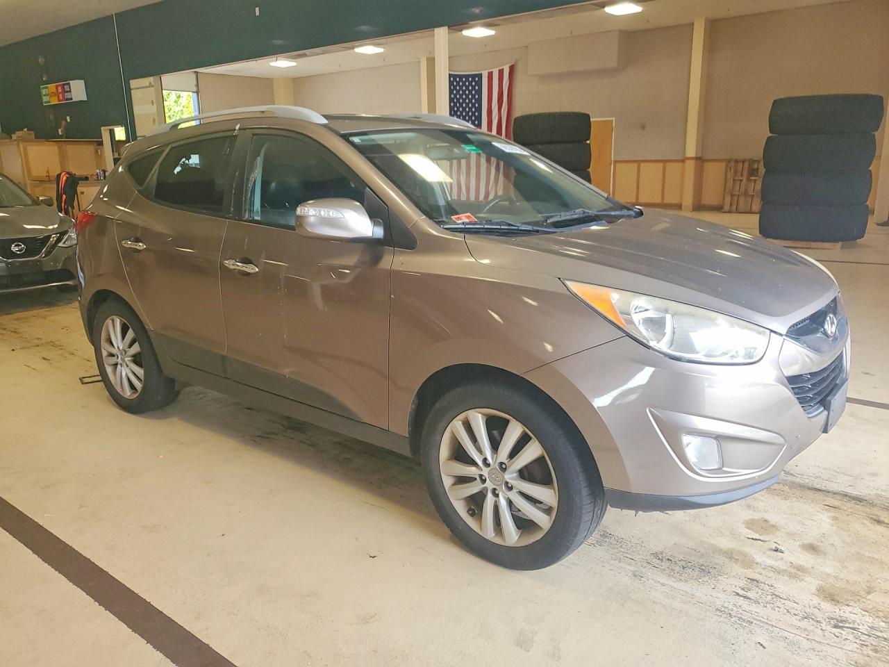 2010 Hyundai Tucson Limited Коричневый vin: KM8JUCAC1AU047207
