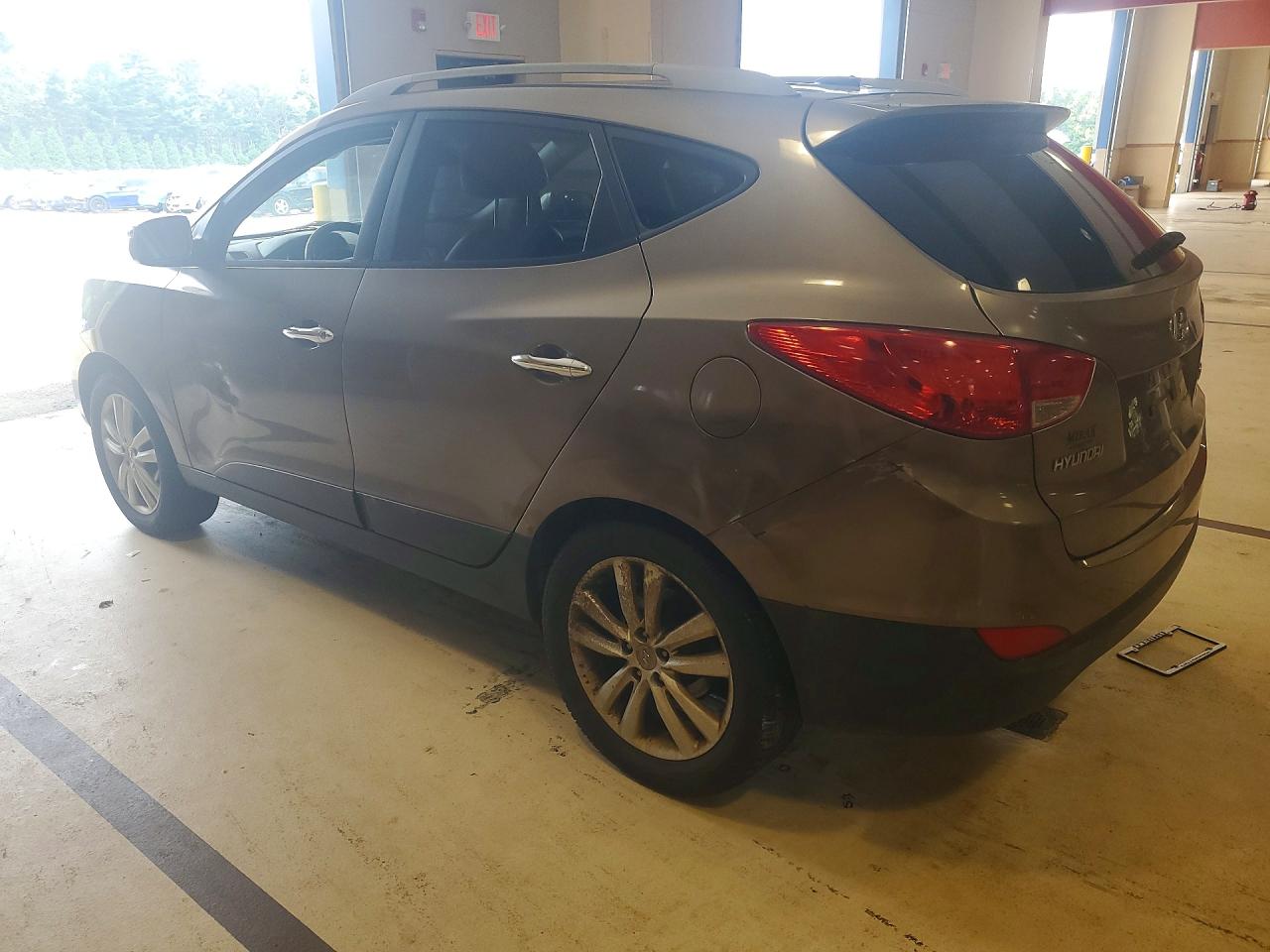 2010 Hyundai Tucson Limited Коричневый vin: KM8JUCAC1AU047207