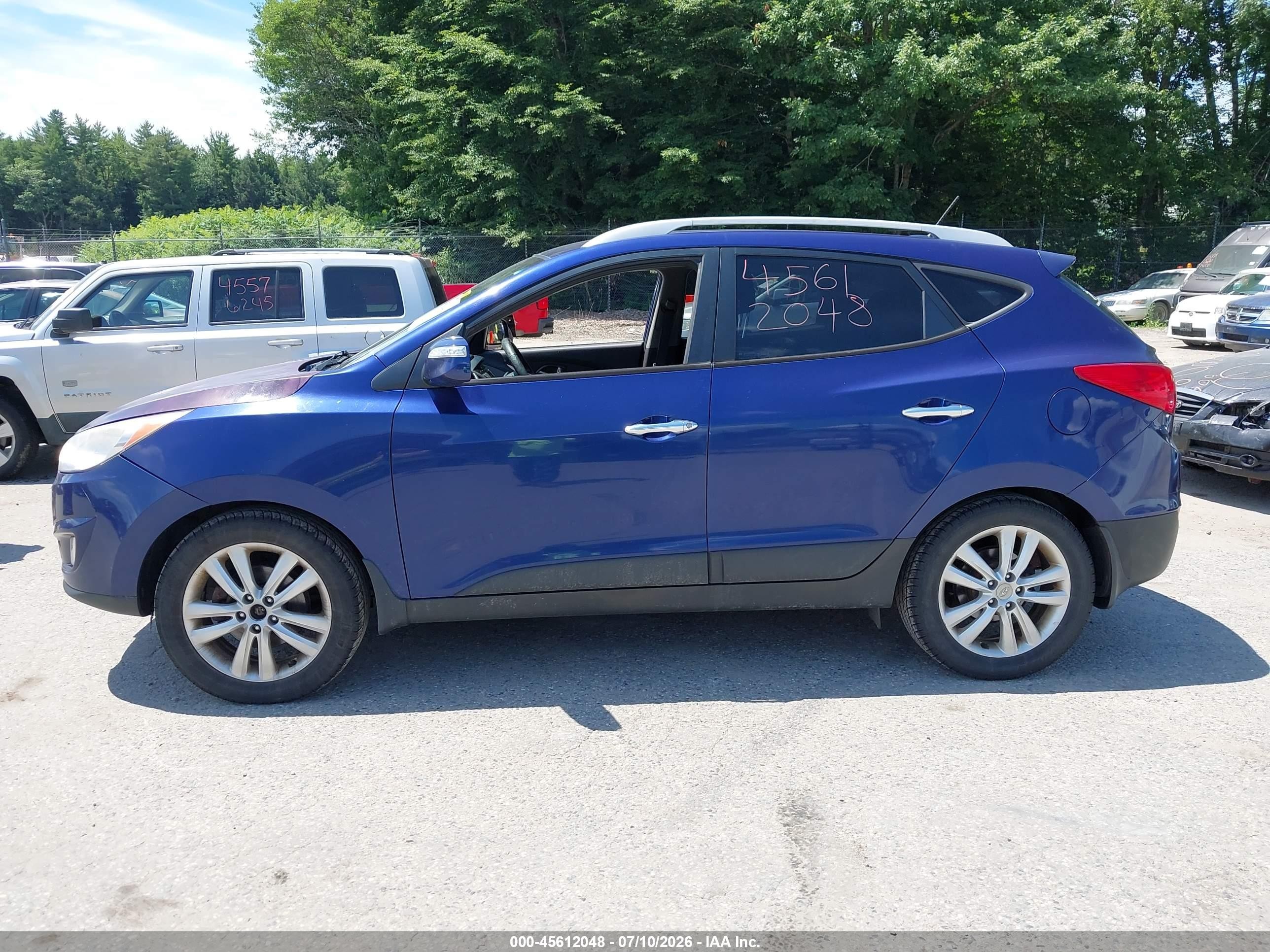 2011 Hyundai Tucson Limited Purple vin: KM8JUCAC1BU316677