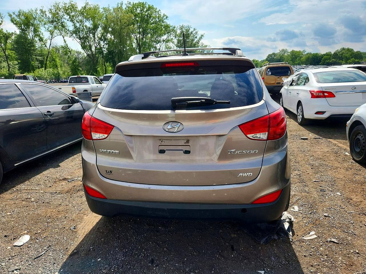 2012 Hyundai Tucson Gls Tan vin: KM8JUCAC1CU415808