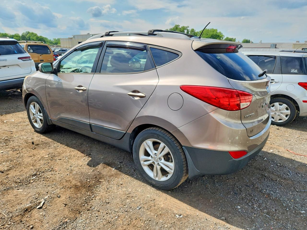 2012 Hyundai Tucson Gls Tan vin: KM8JUCAC1CU415808