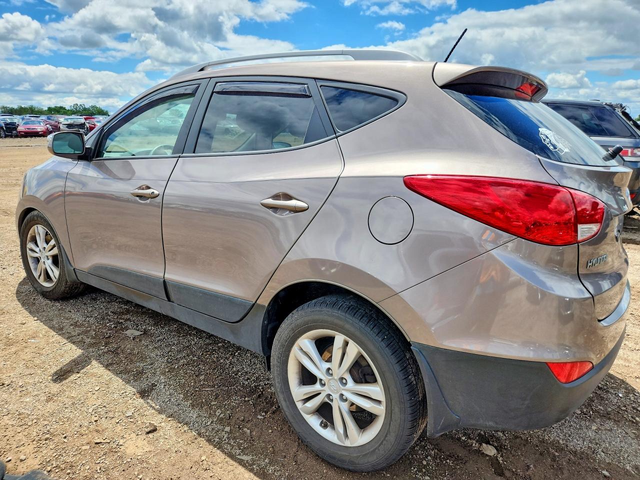 2012 Hyundai Tucson Gls Brown vin: KM8JUCAC1CU461686