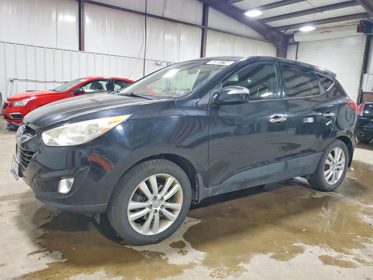 2013 Hyundai Tucson Limited Black vin: KM8JUCAC1DU612091