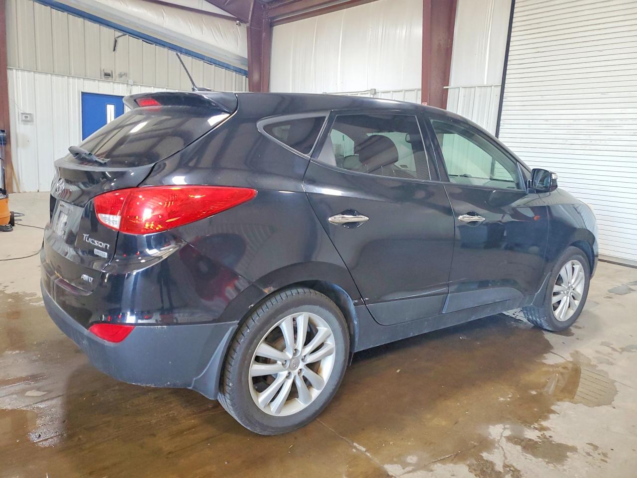 2013 Hyundai Tucson Limited Black vin: KM8JUCAC1DU612091
