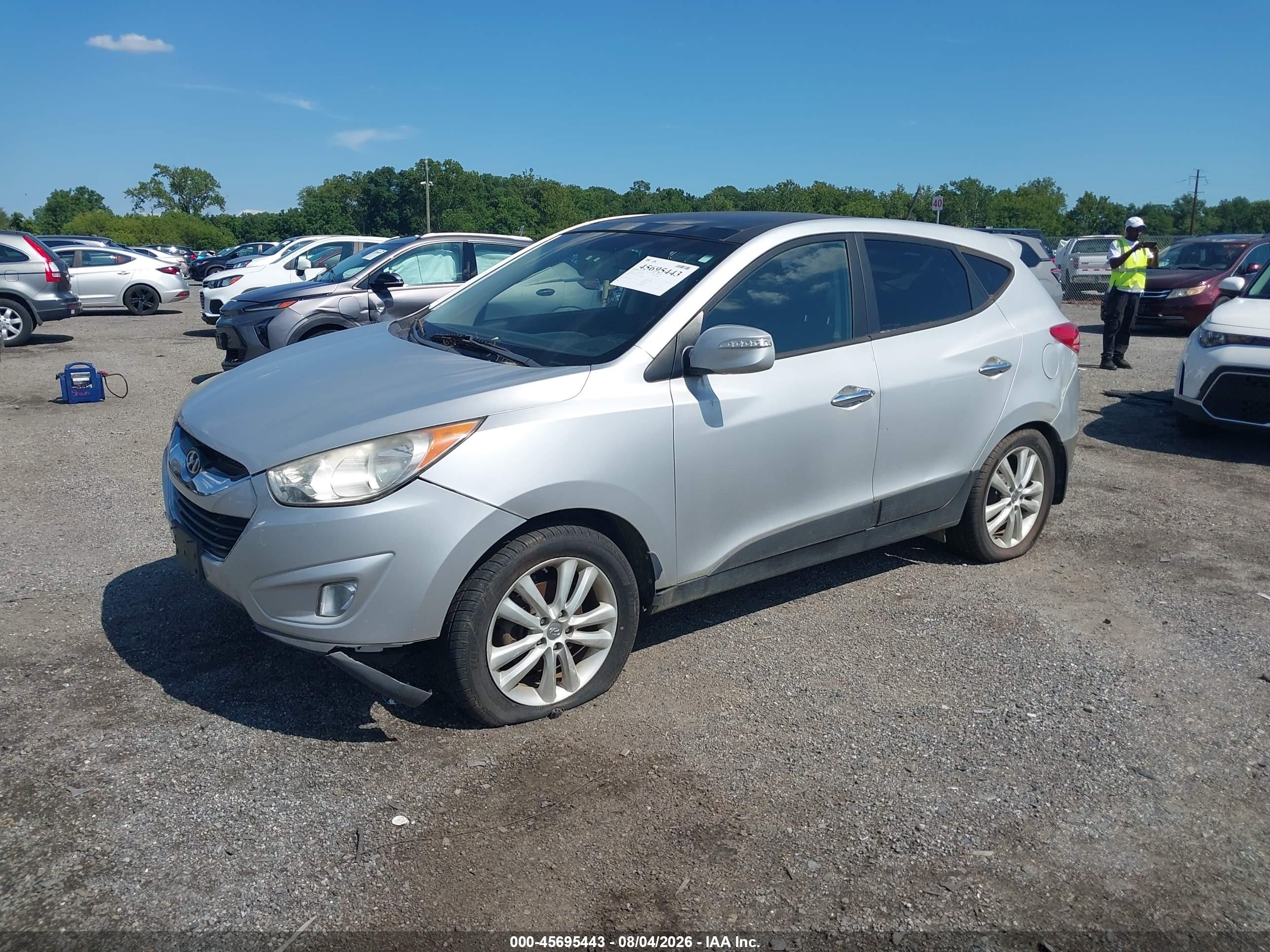 2013 Hyundai Tucson Limited Silver vin: KM8JUCAC1DU715916