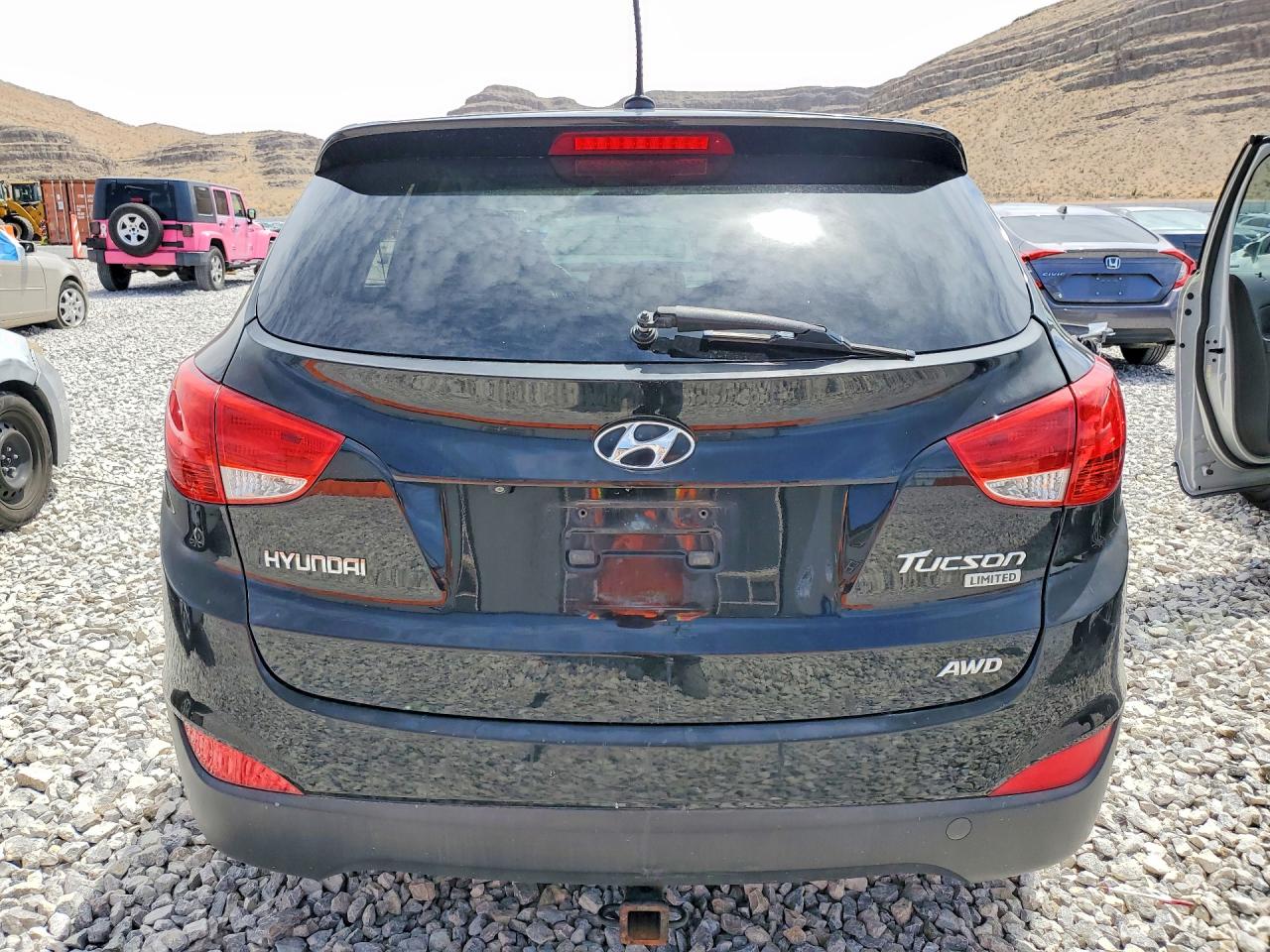 2011 Hyundai Tucson Limited Black vin: KM8JUCAC2BU312122