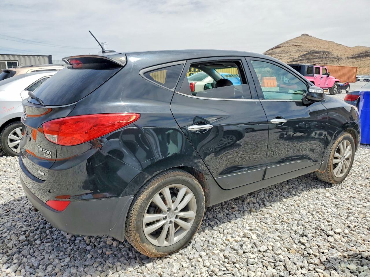 2011 Hyundai Tucson Limited Black vin: KM8JUCAC2BU312122