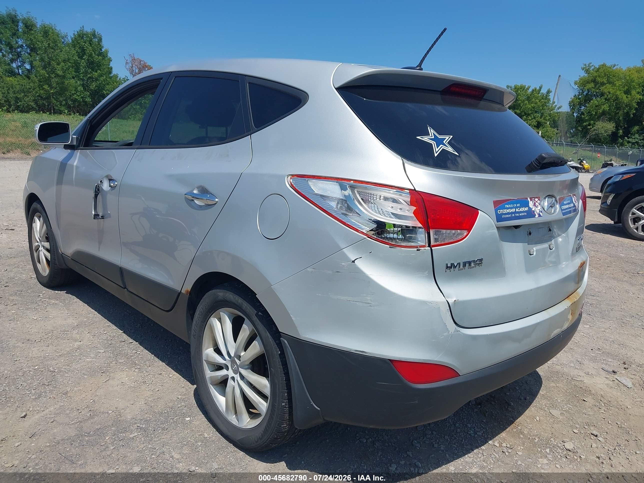 2013 Hyundai Tucson Limited Silver vin: KM8JUCAC2DU623374