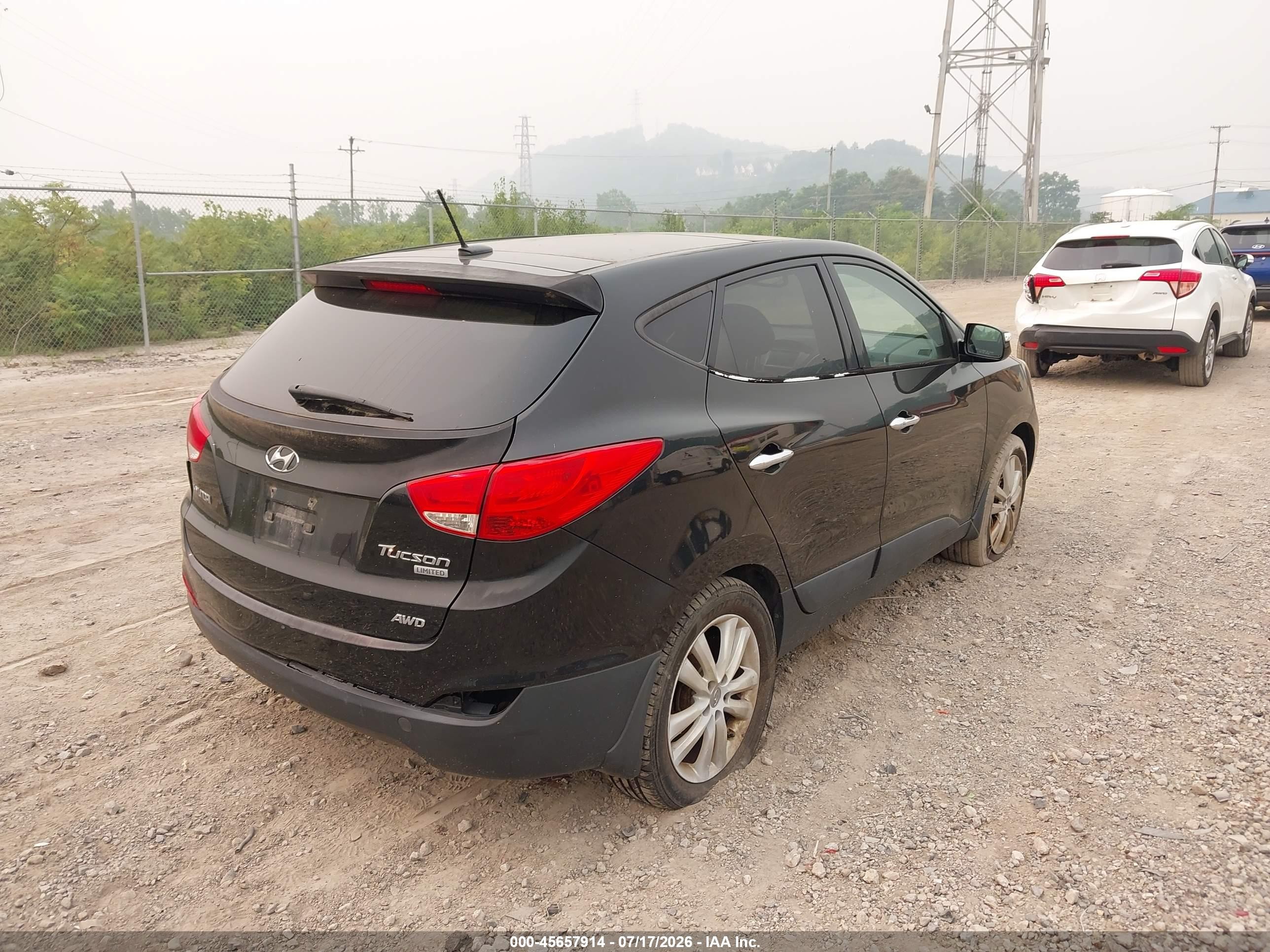 2013 Hyundai Tucson Limited Black vin: KM8JUCAC2DU774697