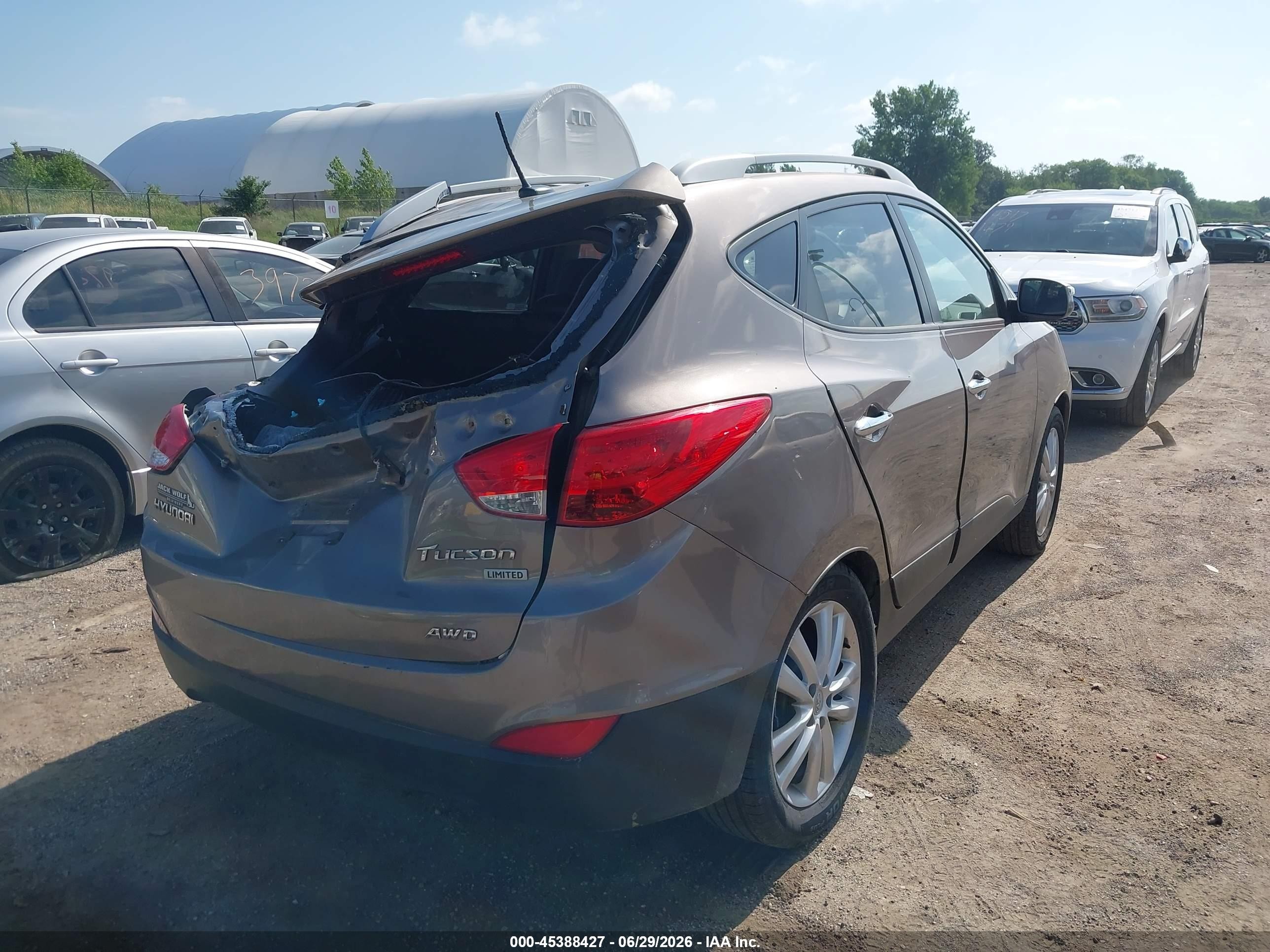 2011 Hyundai Tucson Limited Brown vin: KM8JUCAC3BU290468