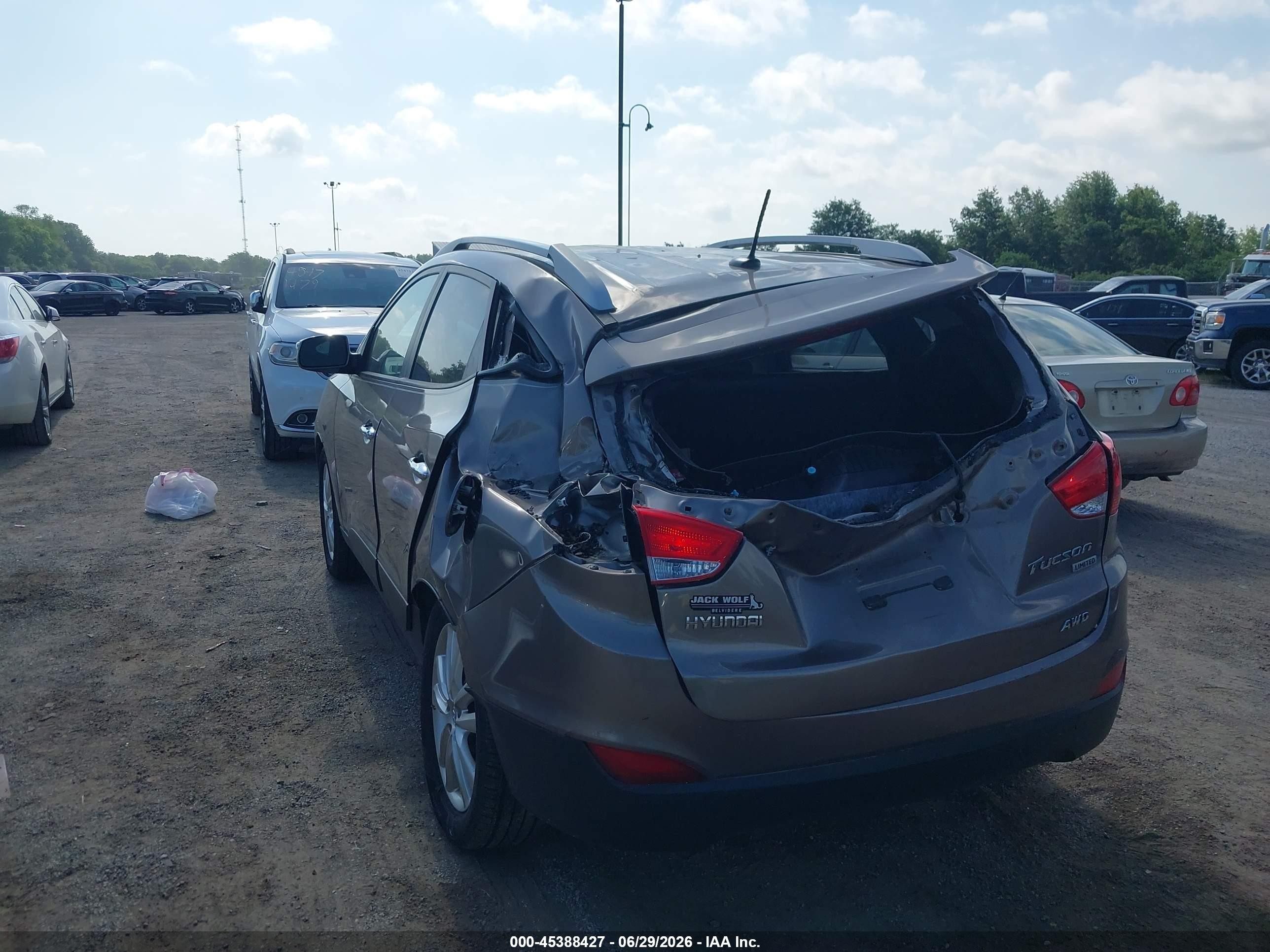 2011 Hyundai Tucson Limited Brown vin: KM8JUCAC3BU290468