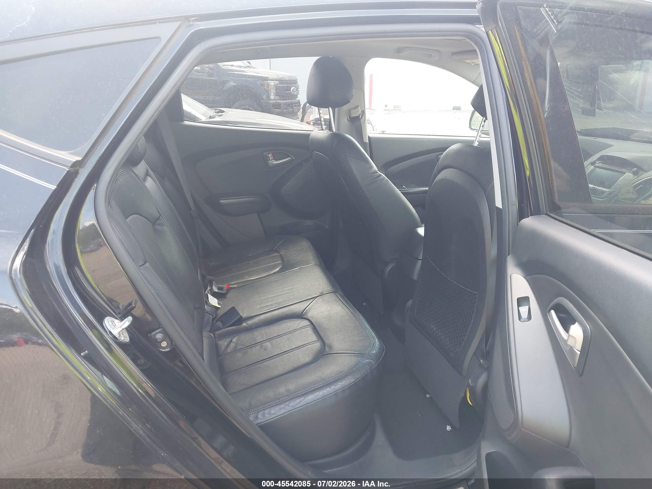 2012 Hyundai Tucson Limited Черный vin: KM8JUCAC3CU402641