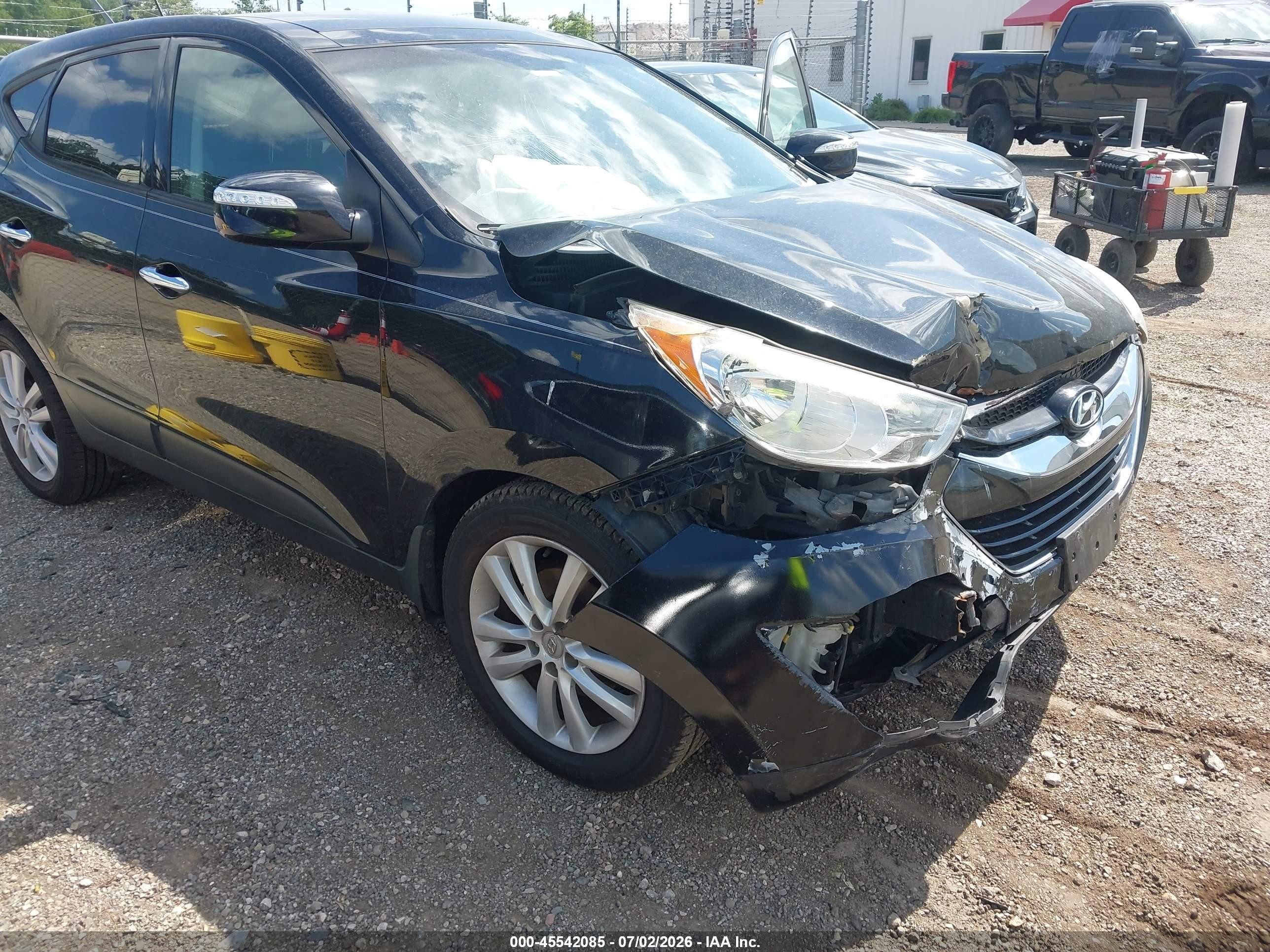 2012 Hyundai Tucson Limited Черный vin: KM8JUCAC3CU402641