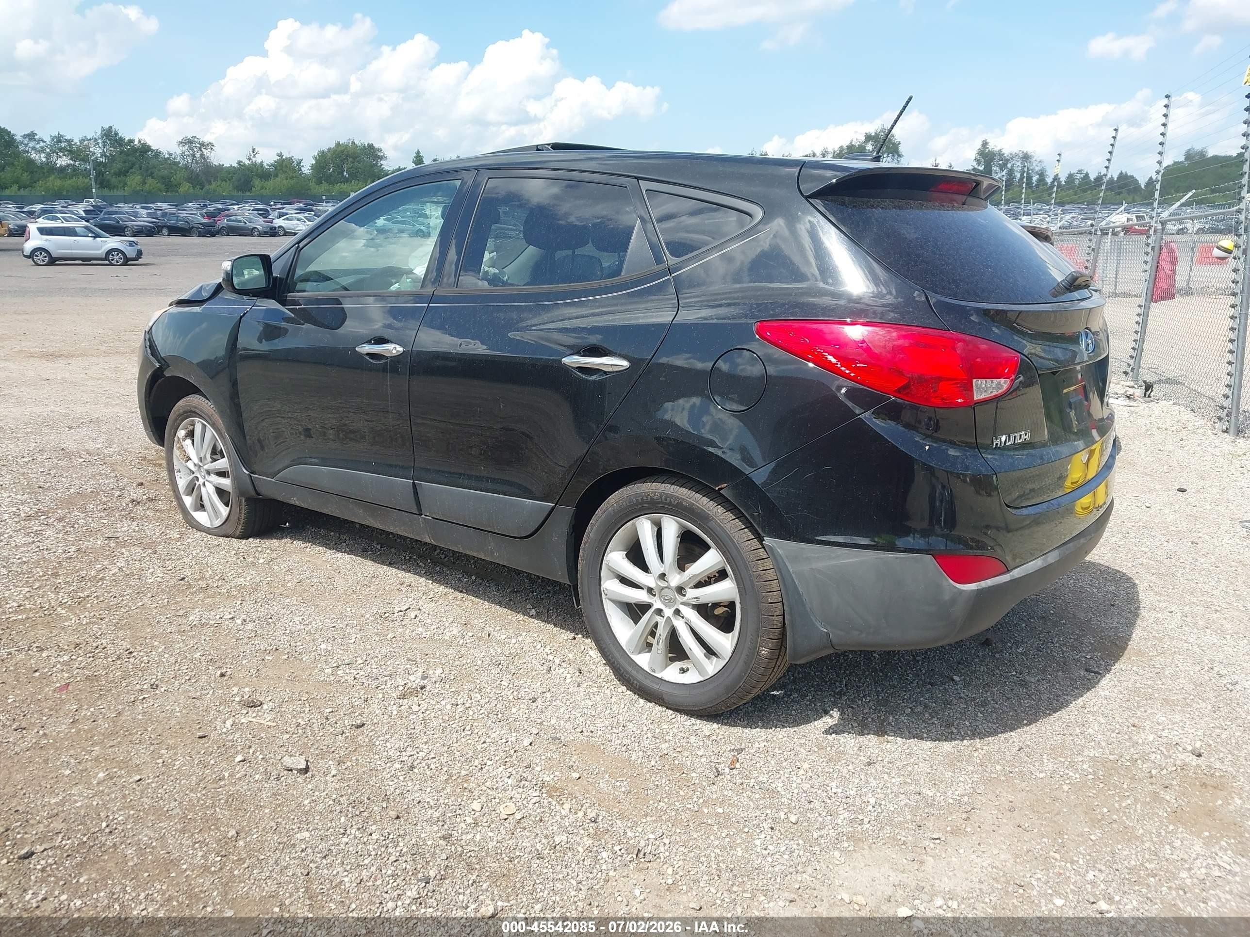 2012 Hyundai Tucson Limited Черный vin: KM8JUCAC3CU402641