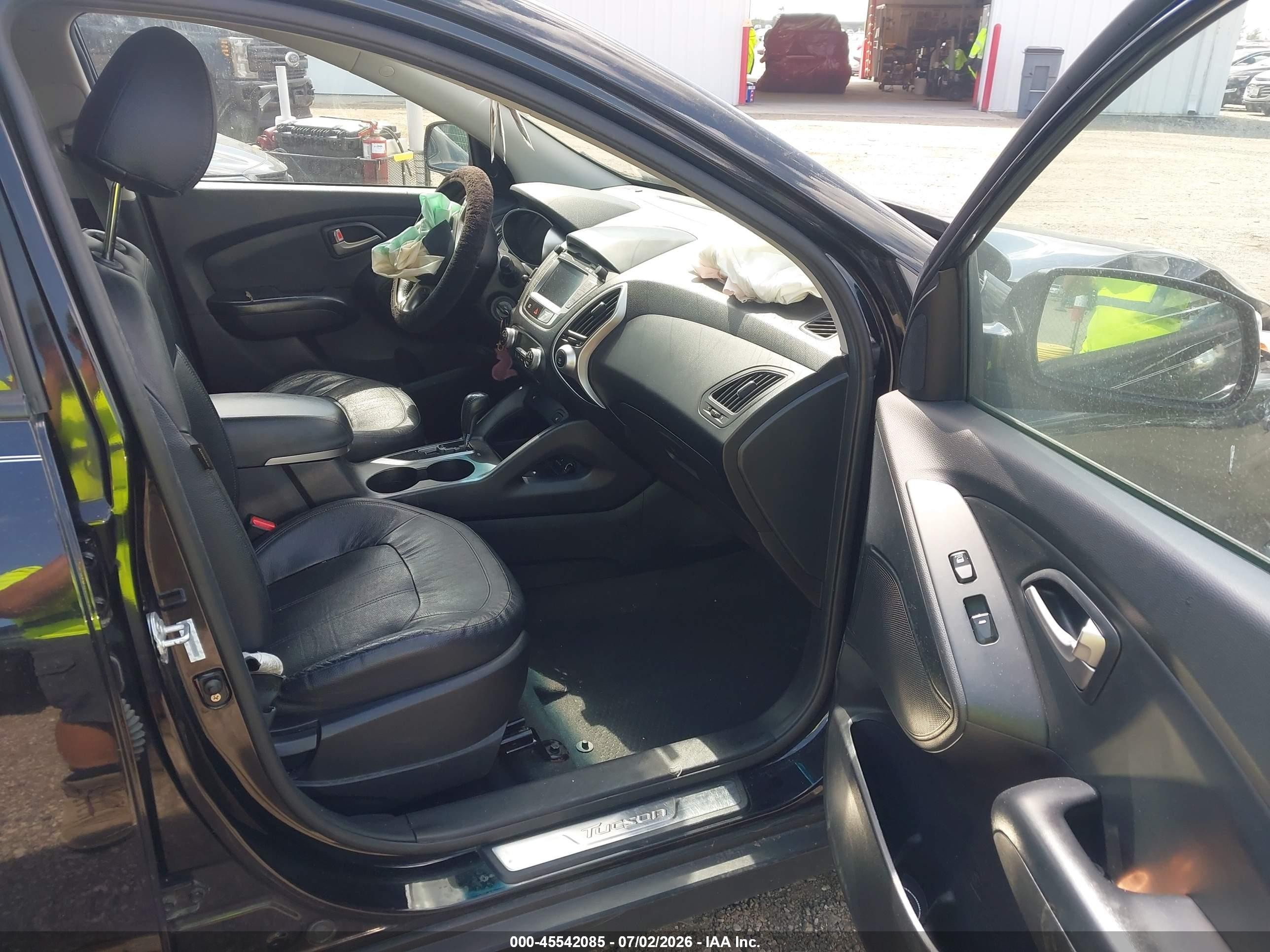 2012 Hyundai Tucson Limited Черный vin: KM8JUCAC3CU402641