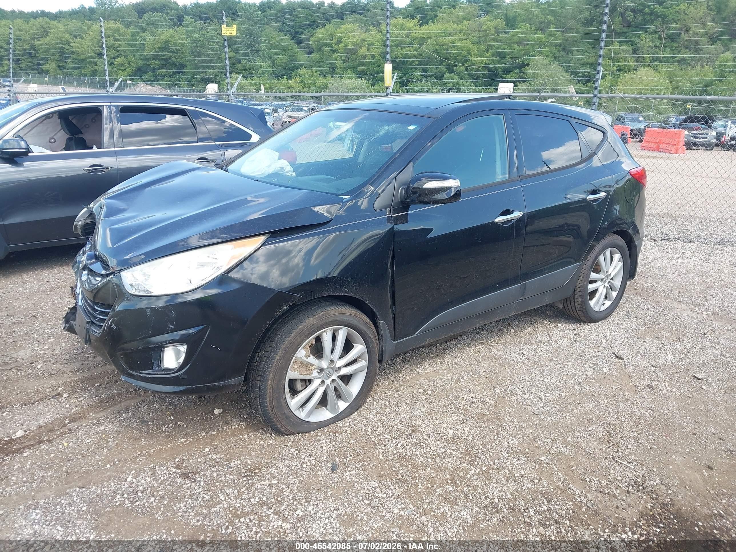 2012 Hyundai Tucson Limited Черный vin: KM8JUCAC3CU402641