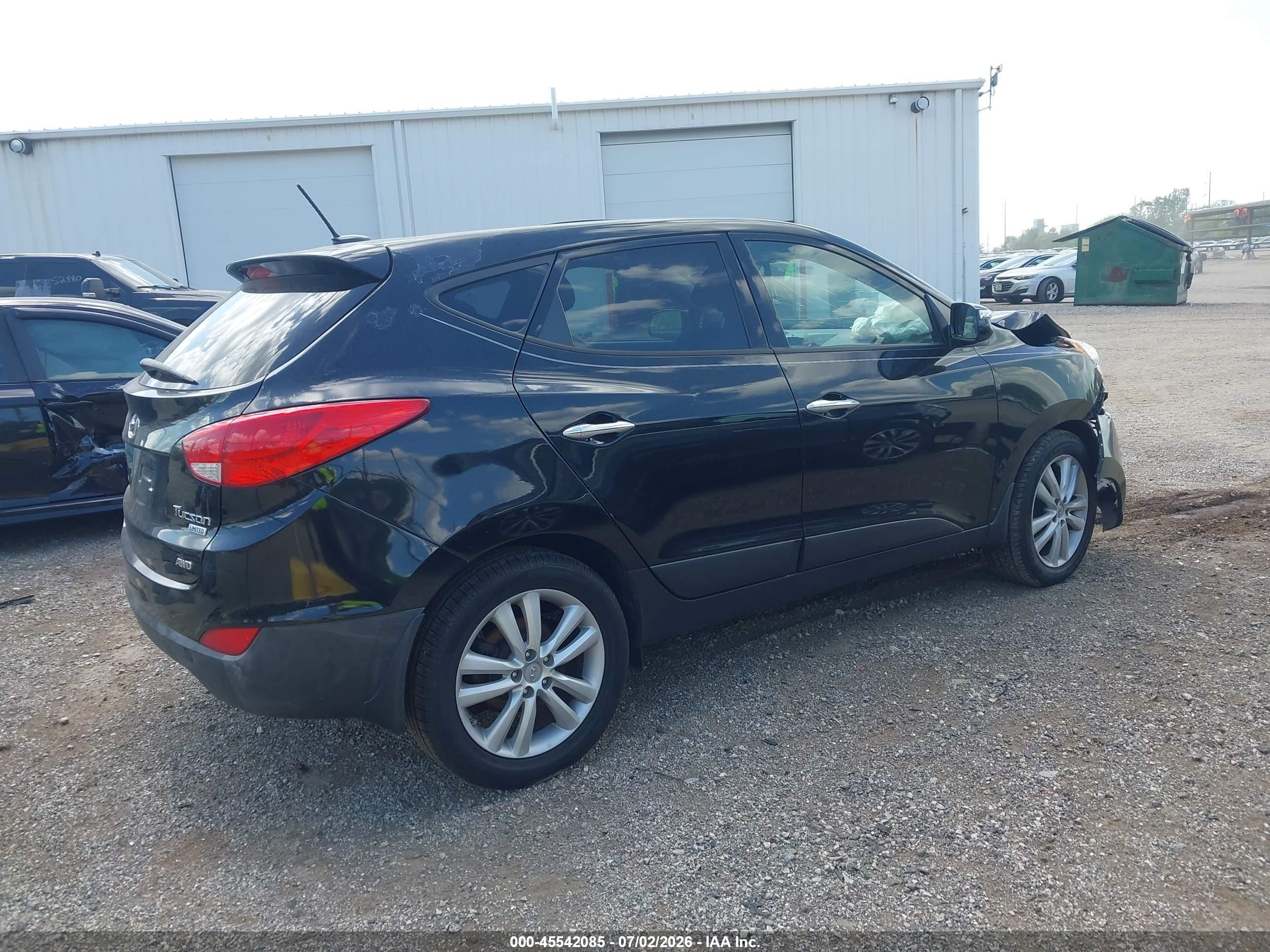 2012 Hyundai Tucson Limited Черный vin: KM8JUCAC3CU402641