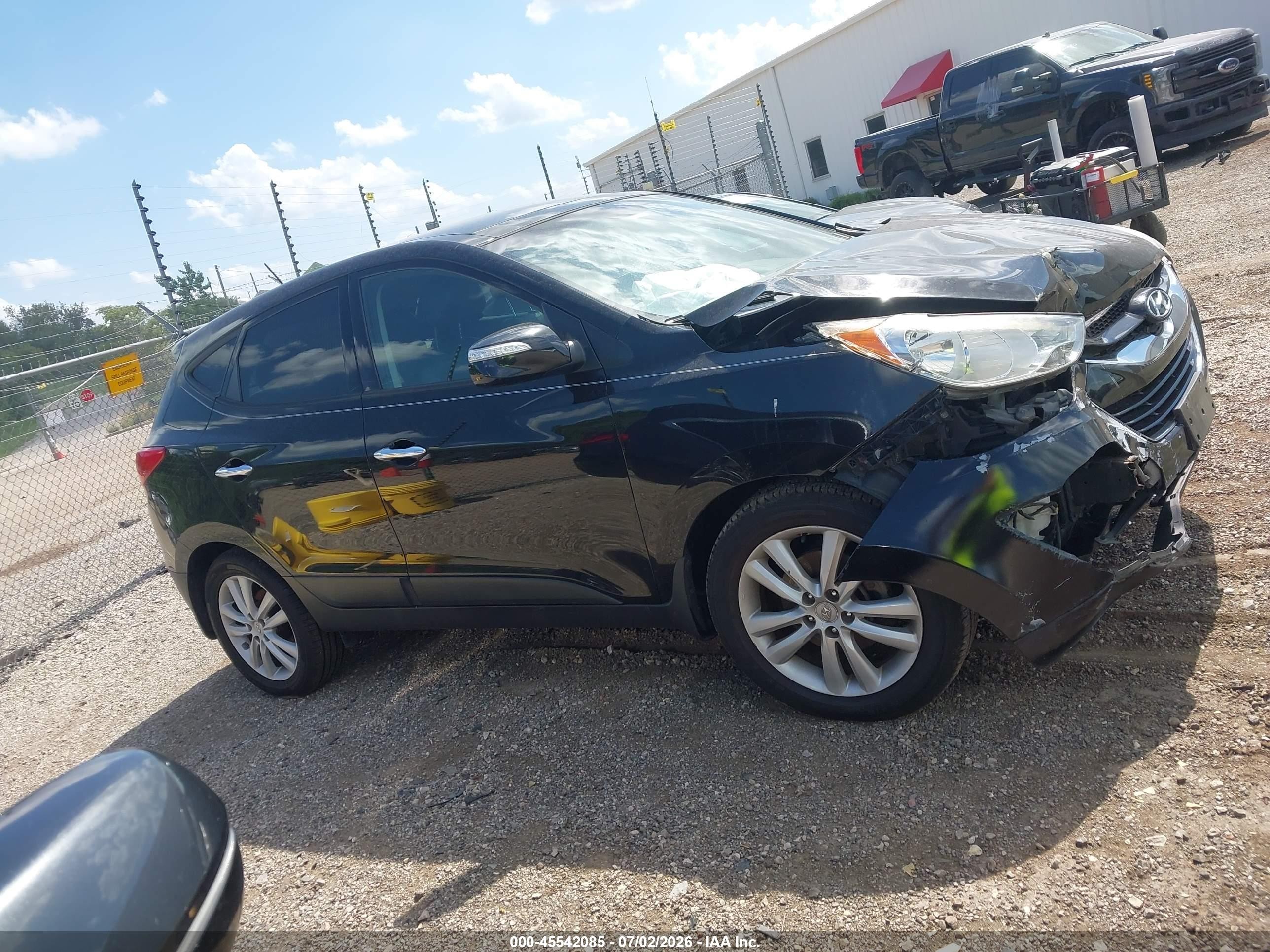 2012 Hyundai Tucson Limited Черный vin: KM8JUCAC3CU402641