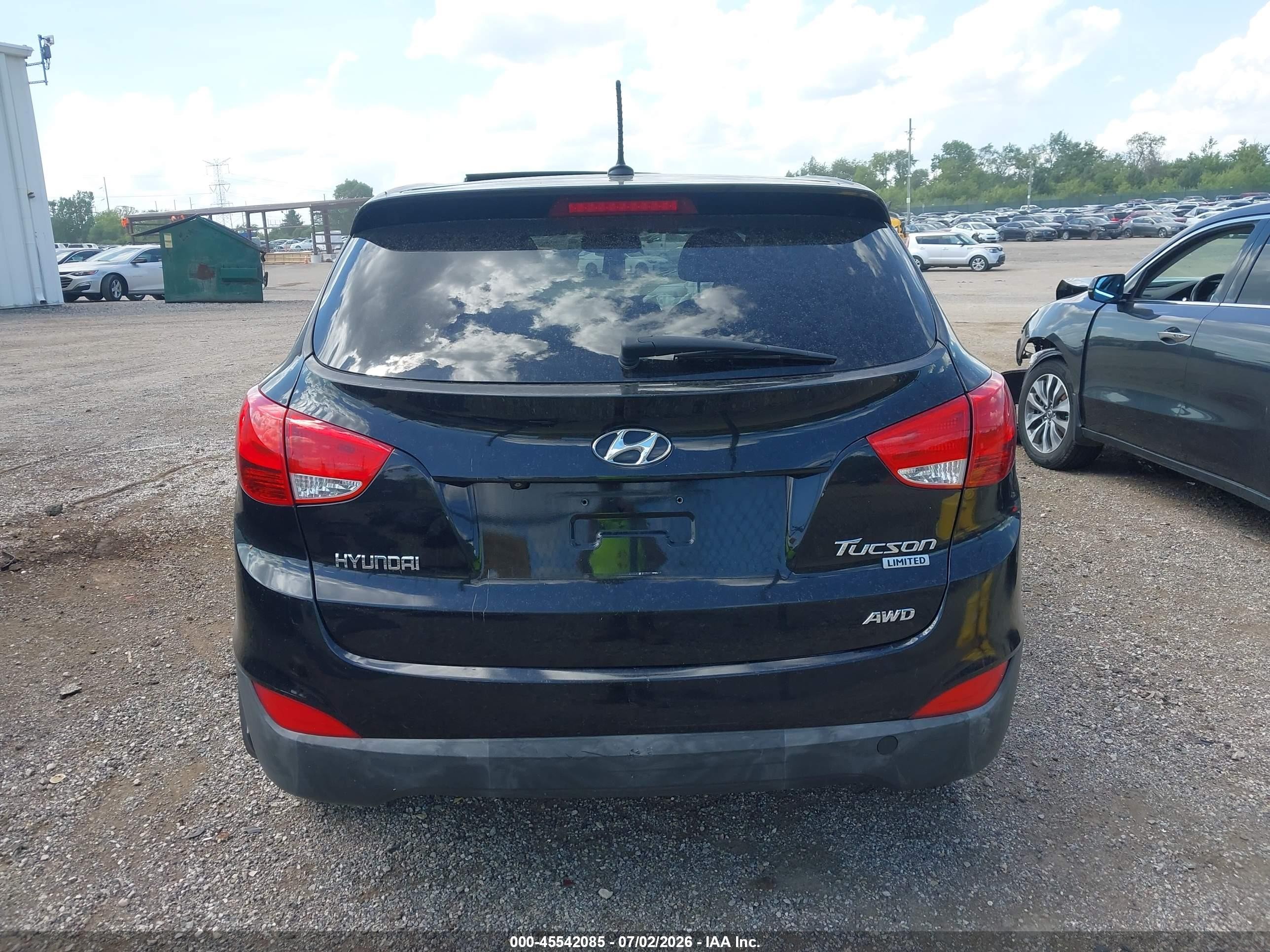 2012 Hyundai Tucson Limited Черный vin: KM8JUCAC3CU402641