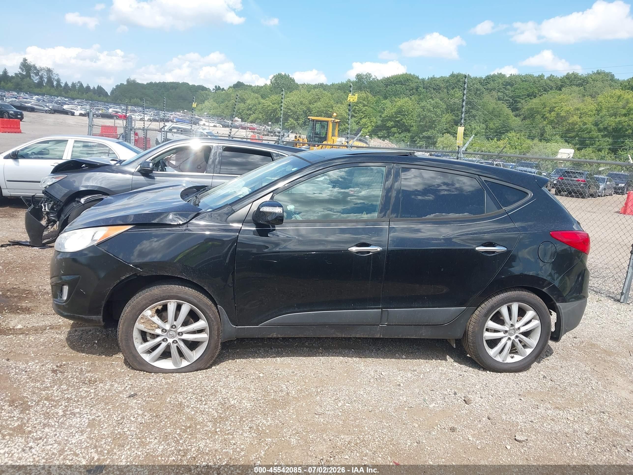 2012 Hyundai Tucson Limited Черный vin: KM8JUCAC3CU402641