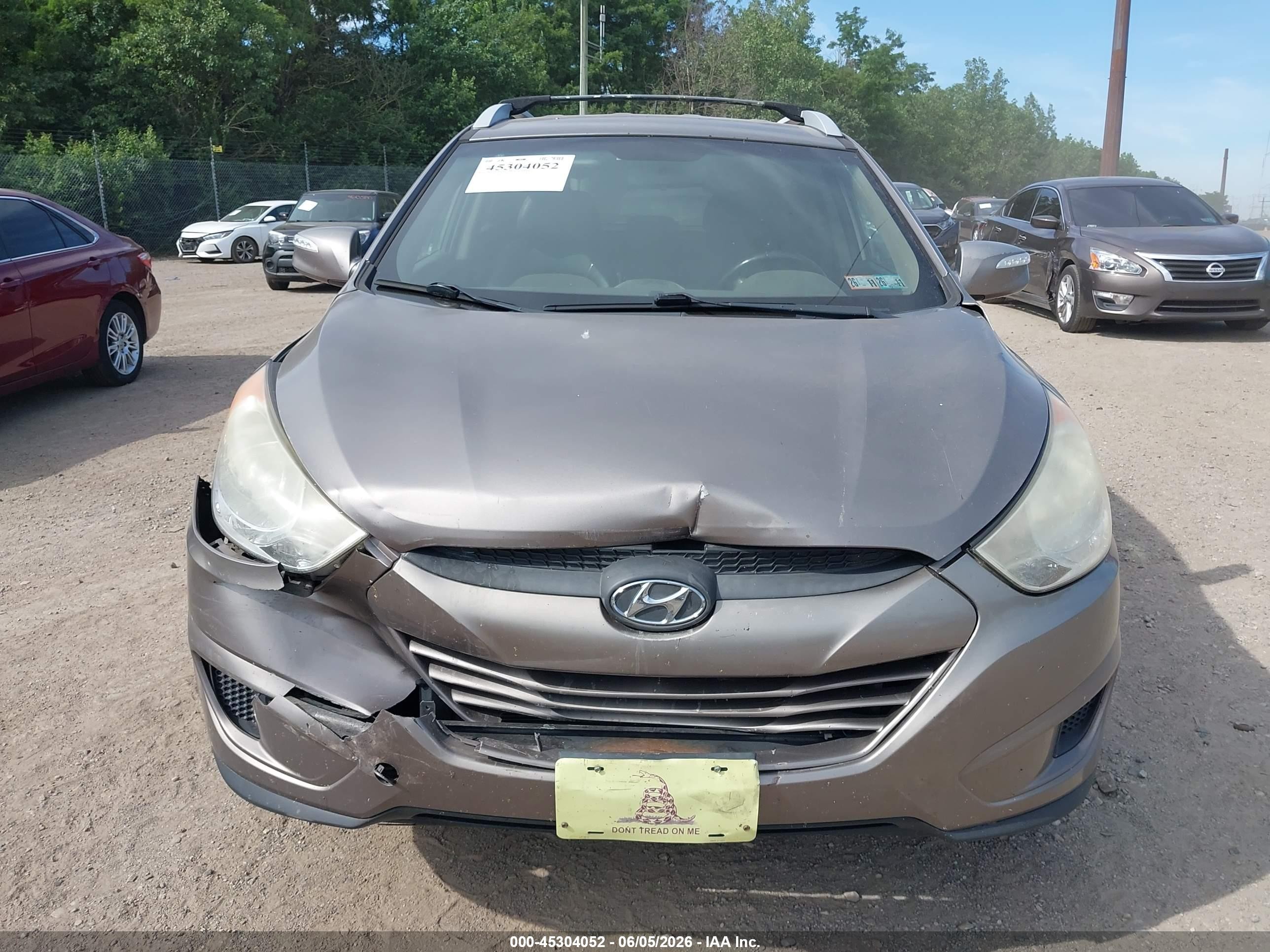 2012 Hyundai Tucson Gls Brown vin: KM8JUCAC3CU404583