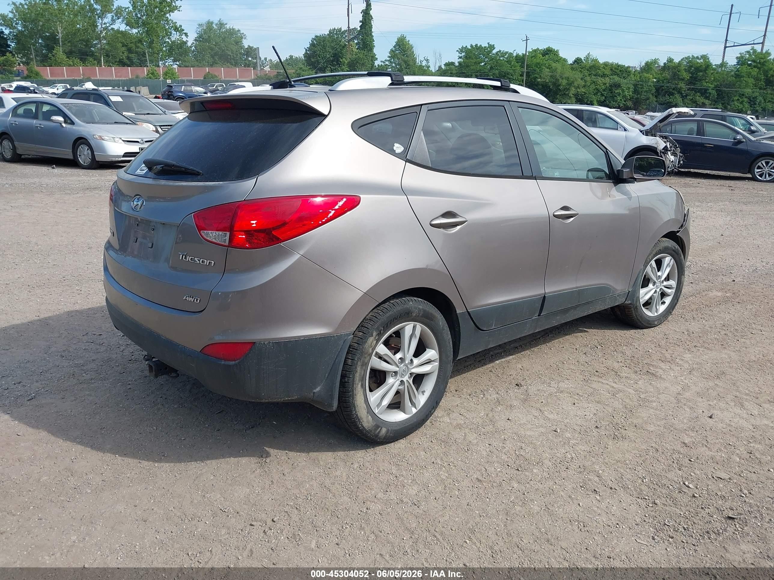 2012 Hyundai Tucson Gls Brown vin: KM8JUCAC3CU404583