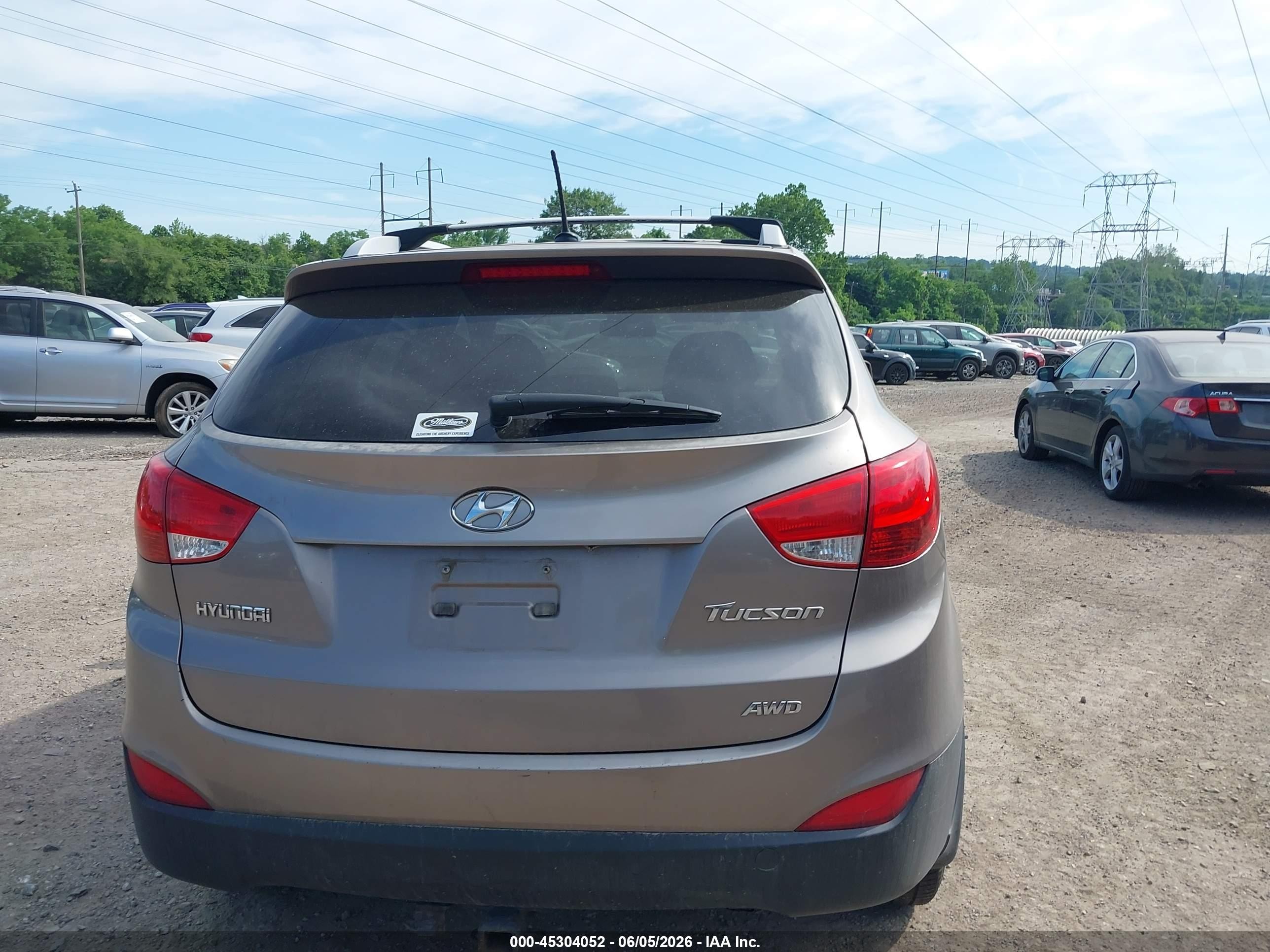 2012 Hyundai Tucson Gls Brown vin: KM8JUCAC3CU404583