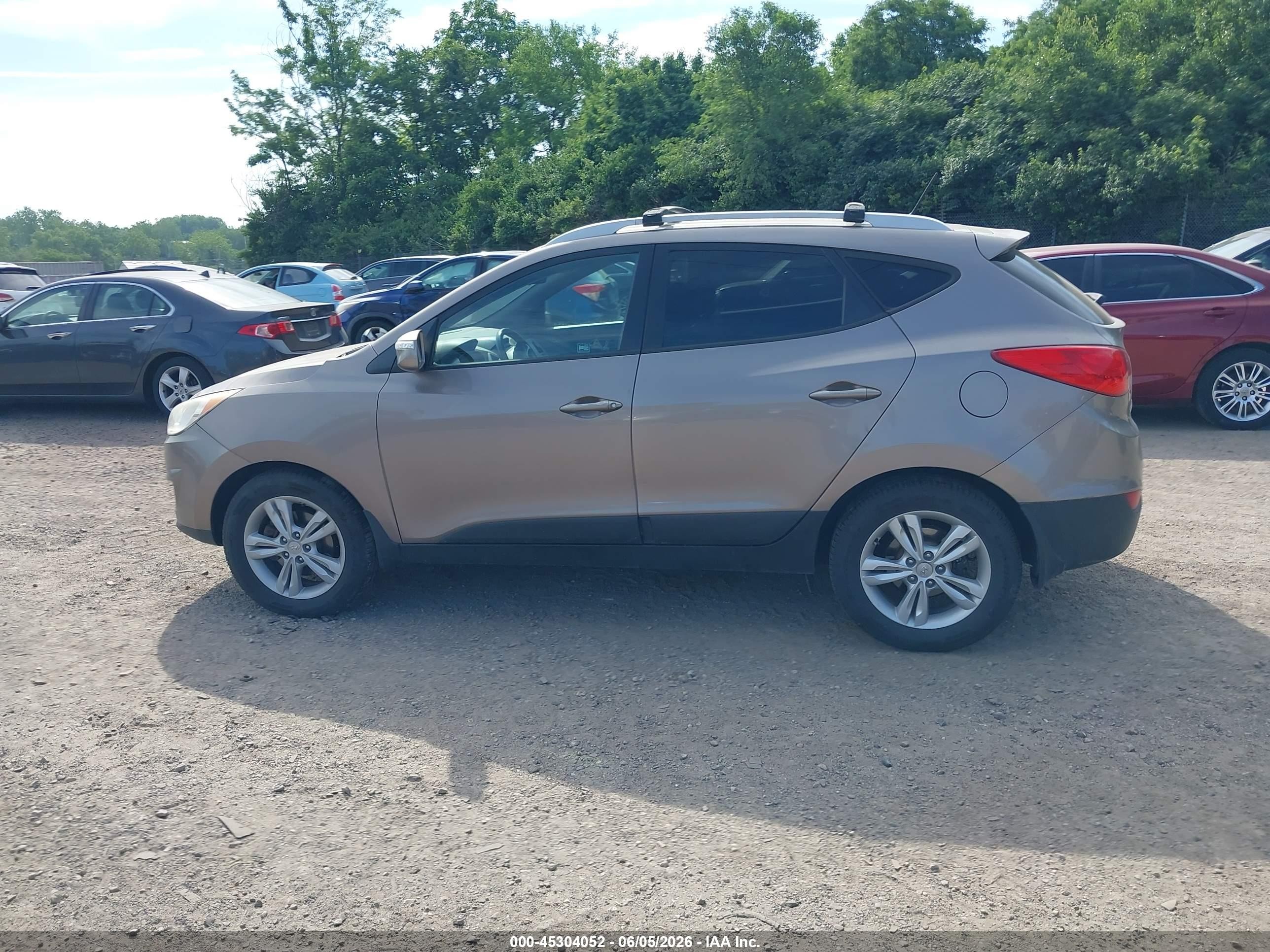 2012 Hyundai Tucson Gls Brown vin: KM8JUCAC3CU404583