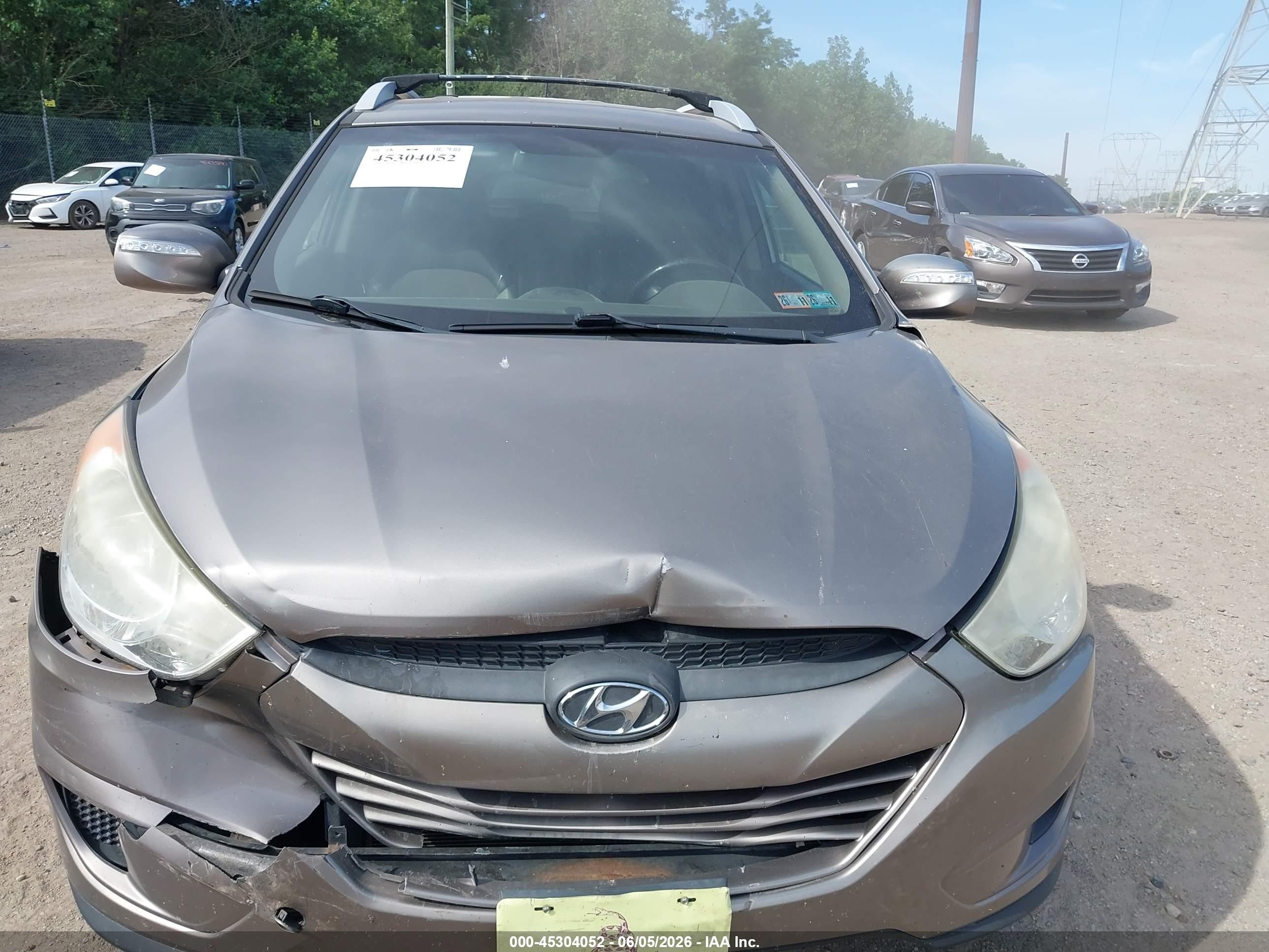2012 Hyundai Tucson Gls Brown vin: KM8JUCAC3CU404583