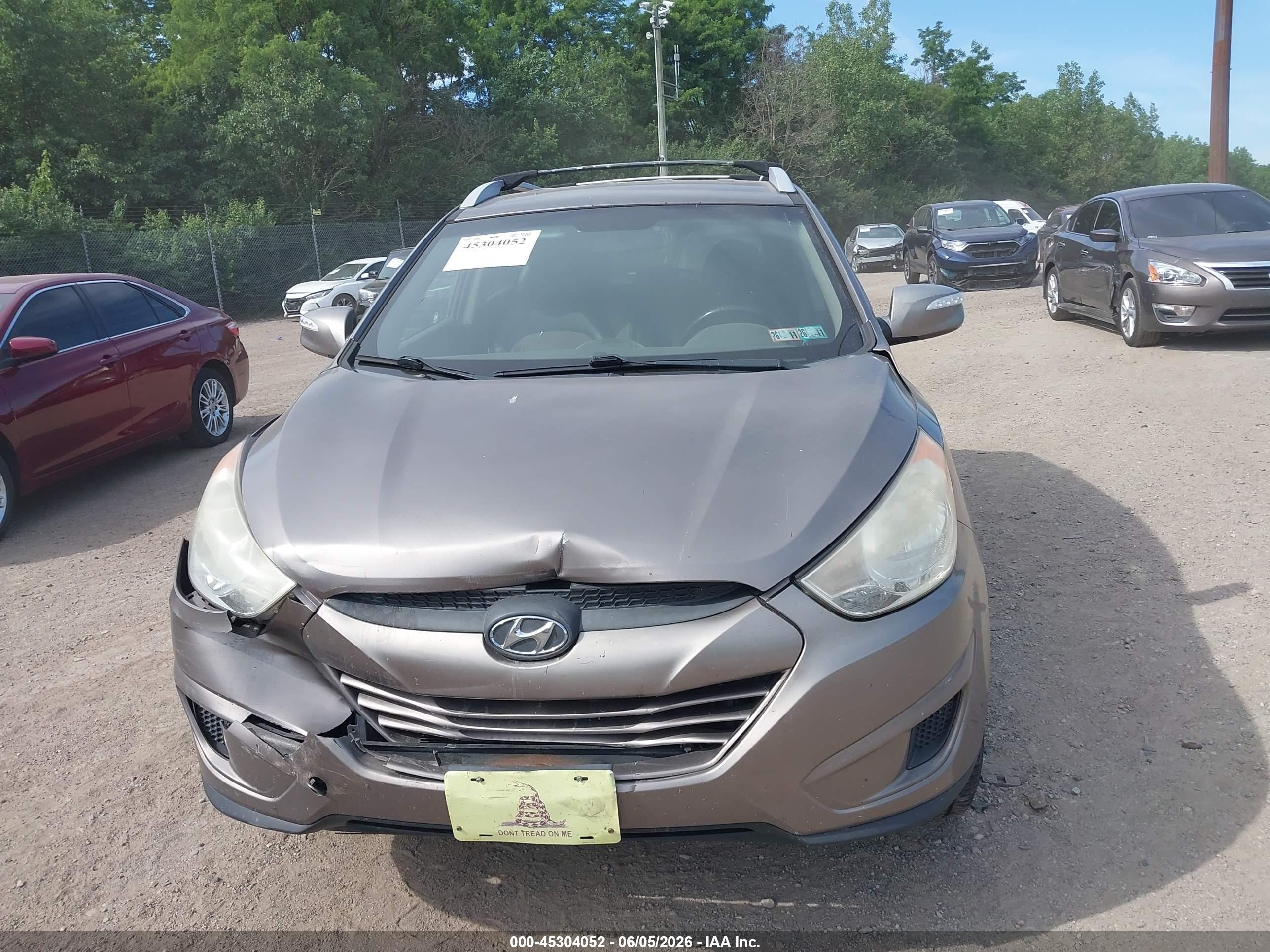 2012 Hyundai Tucson Gls Brown vin: KM8JUCAC3CU404583