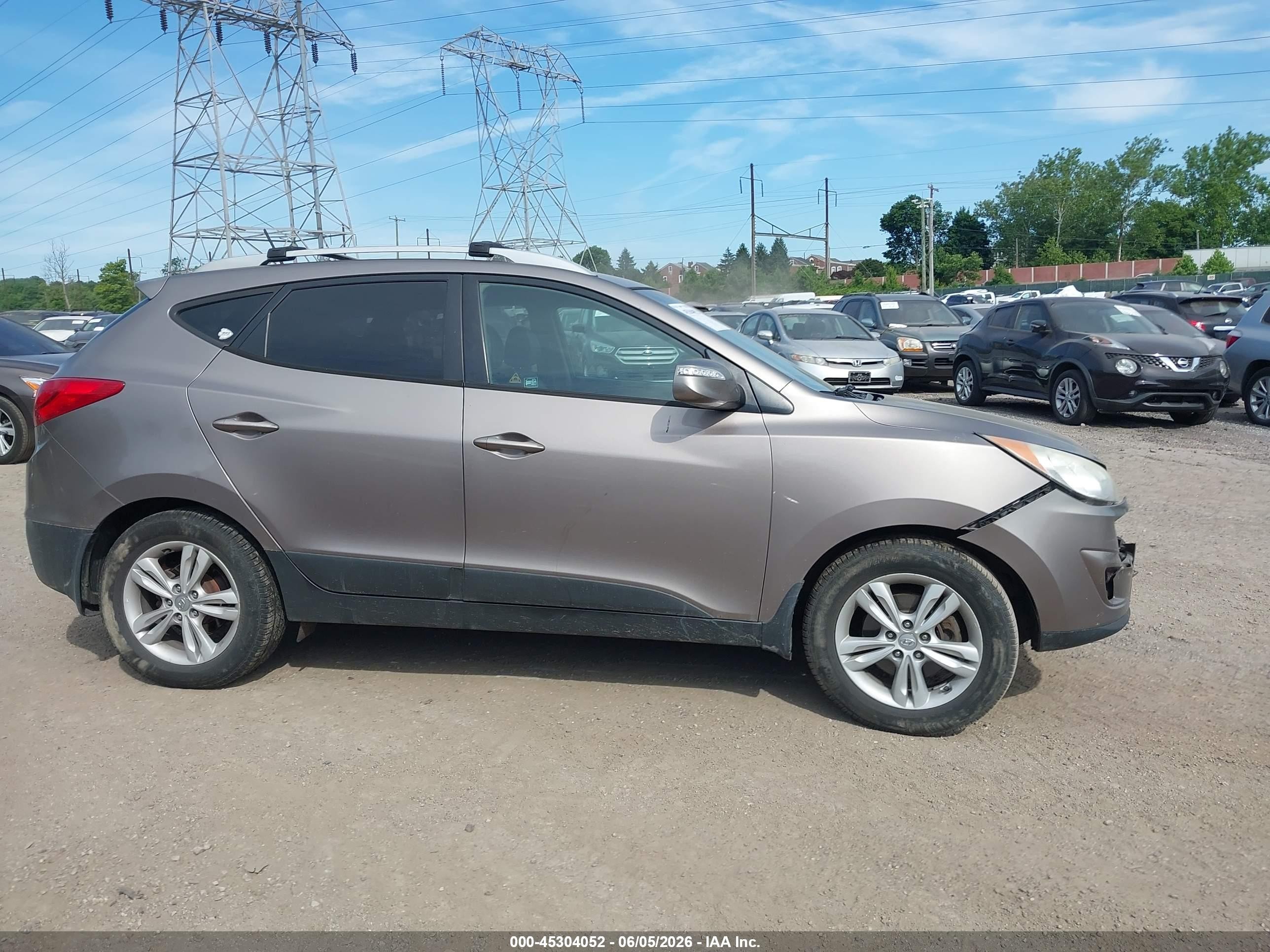 2012 Hyundai Tucson Gls Brown vin: KM8JUCAC3CU404583