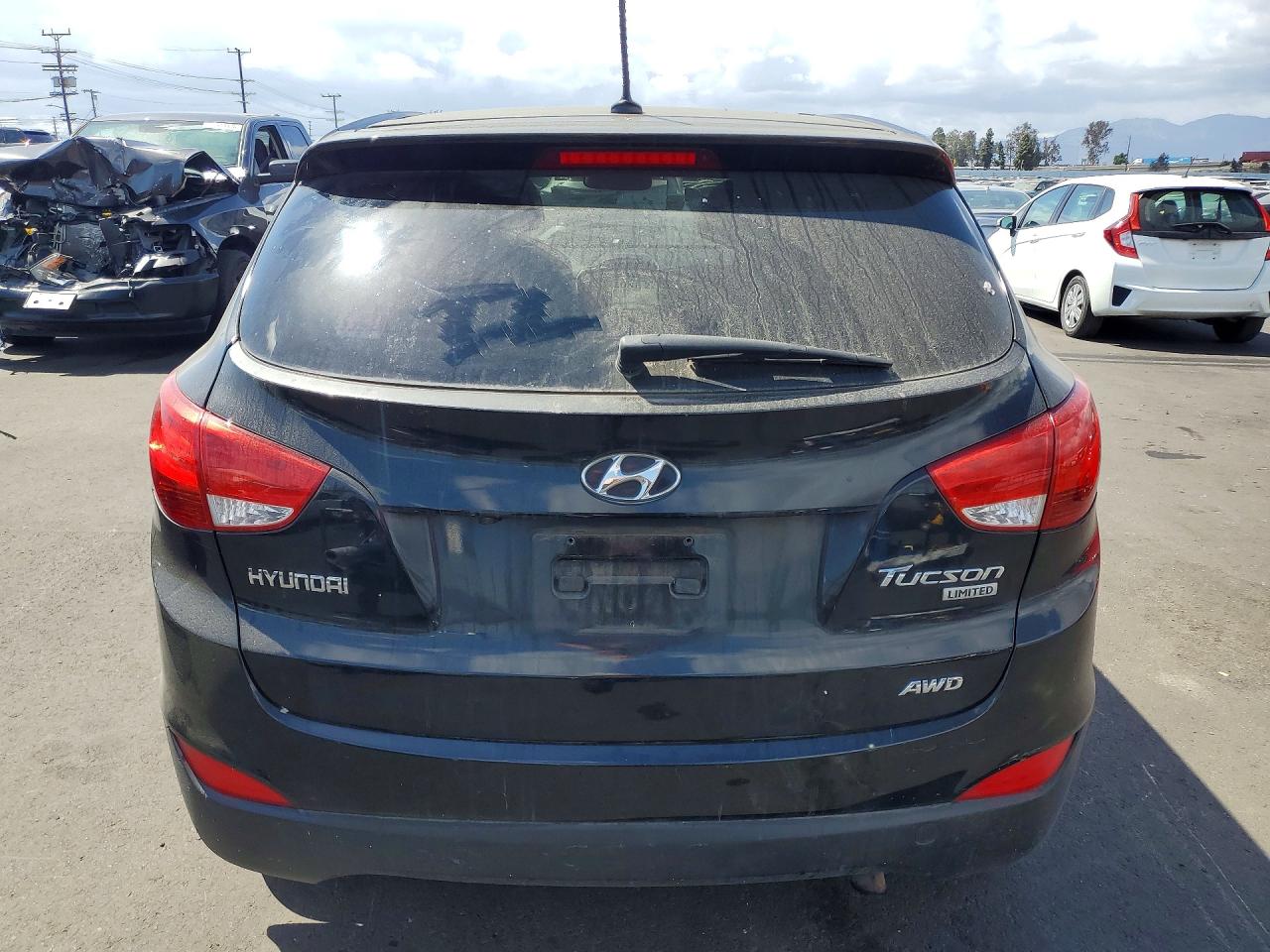 2012 Hyundai Tucson Limited Black vin: KM8JUCAC3CU510239