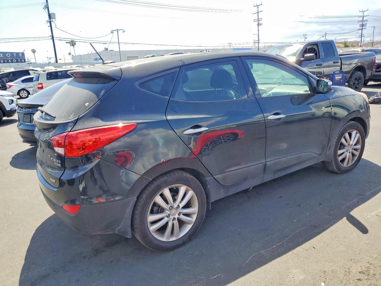 2012 Hyundai Tucson Limited Black vin: KM8JUCAC3CU510239