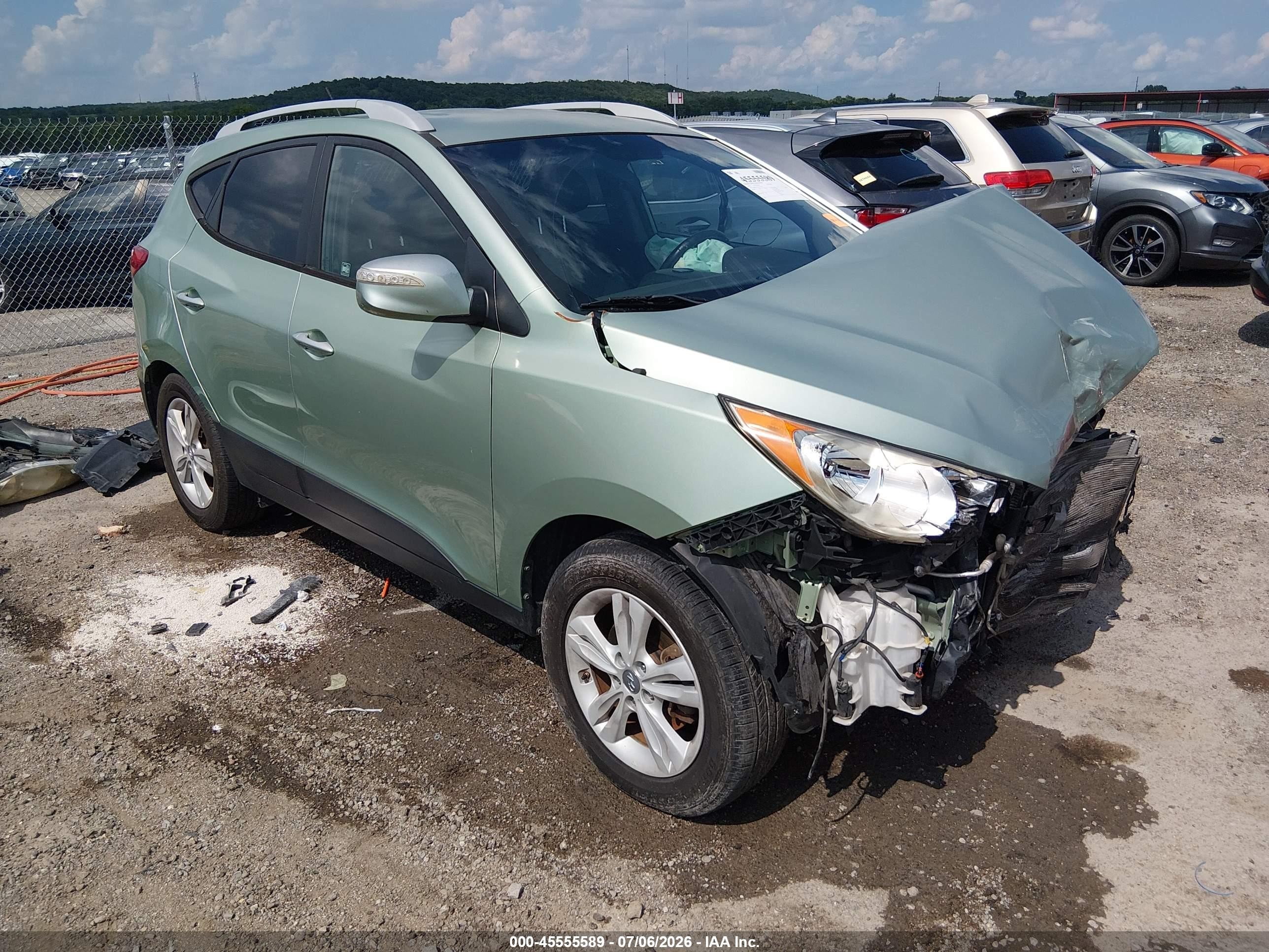2012 Hyundai Tucson Gls Brown vin: KM8JUCAC3CU533410