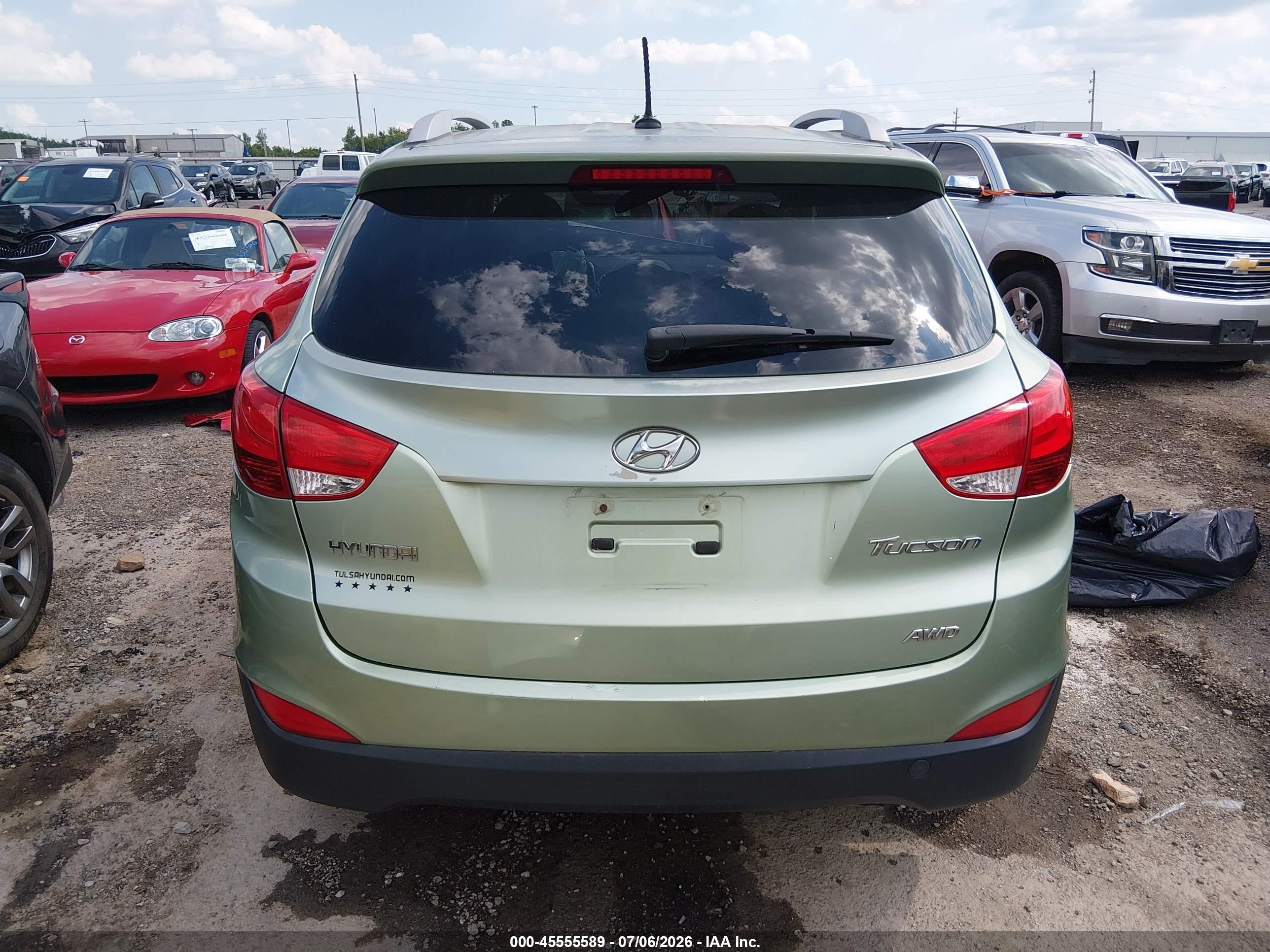 2012 Hyundai Tucson Gls Brown vin: KM8JUCAC3CU533410
