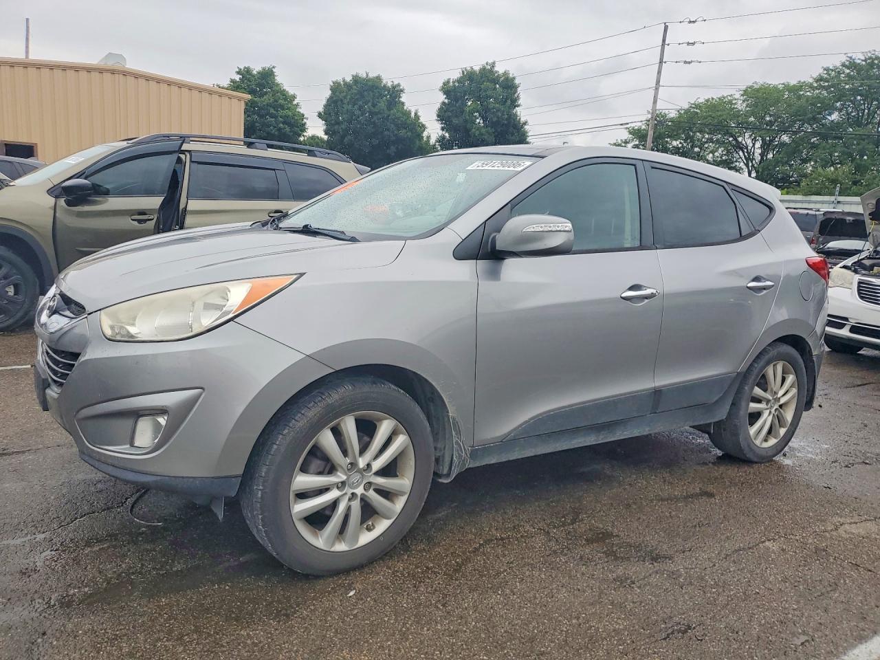 2013 Hyundai Tucson Limited Silver vin: KM8JUCAC3DU558132