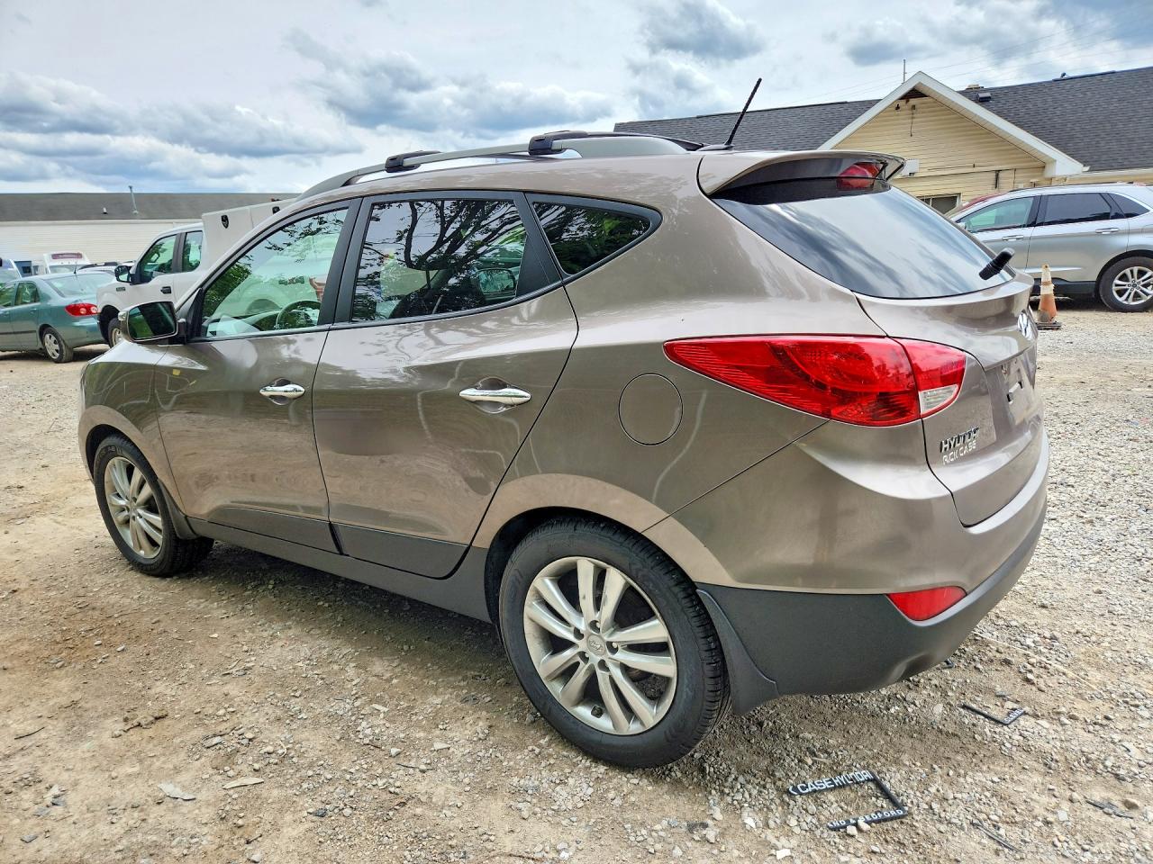 2013 Hyundai Tucson Limited Tan vin: KM8JUCAC3DU621147