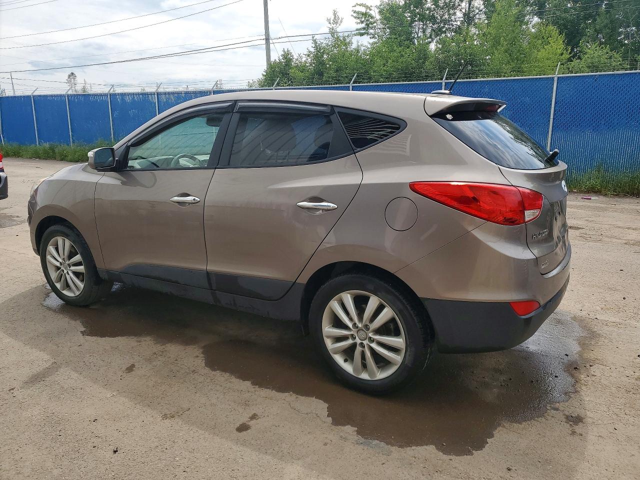2013 Hyundai Tucson Gls Brown vin: KM8JUCAC3DU630320